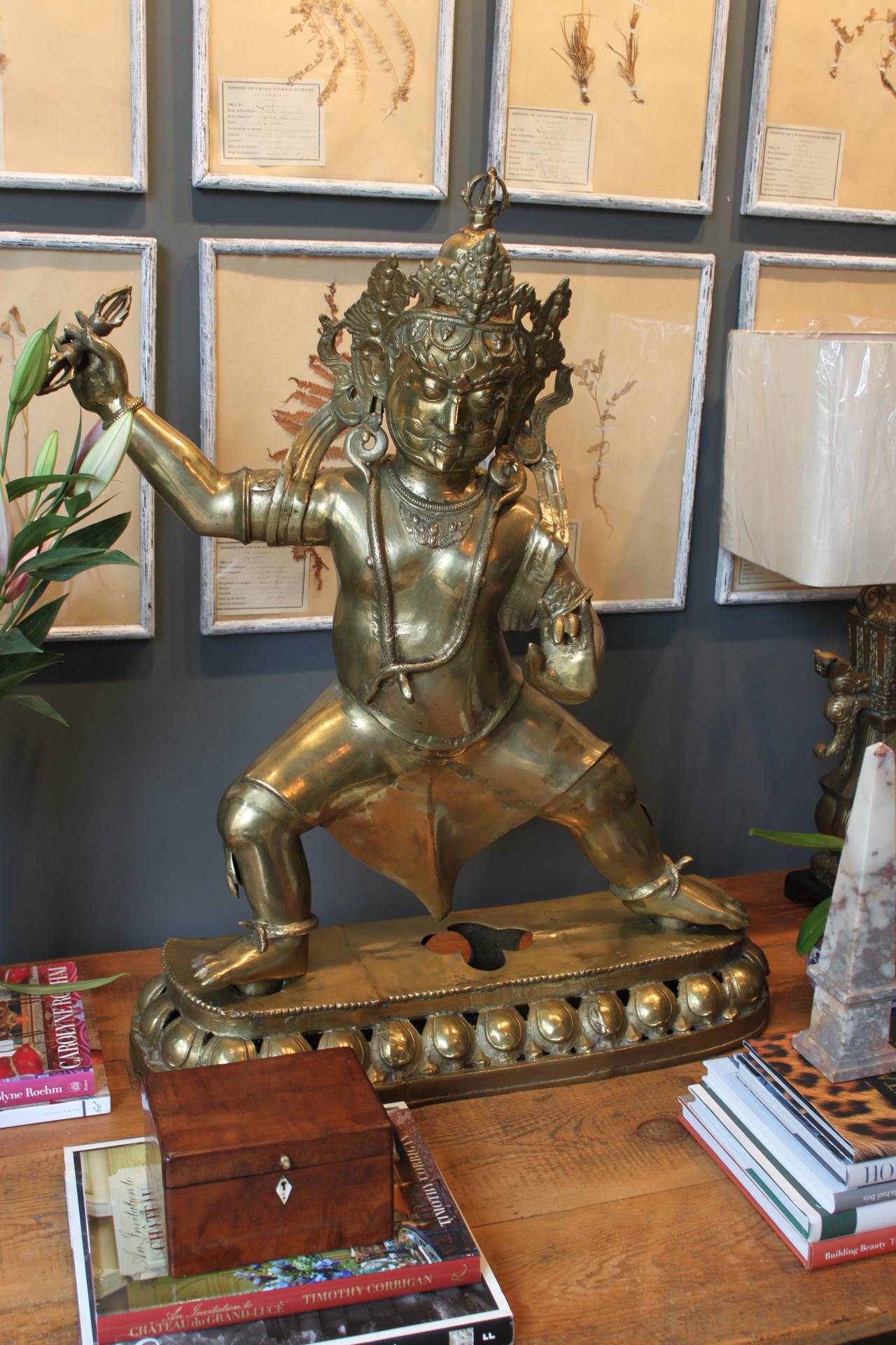 Massive brass statue of Vajrapani. This statue is in two parts with the body completely lifting out of the brass base. The statue is exceptionally heavy with very detailed brass figuring.

Vajrapani is the protector and guide of the Buddha, and