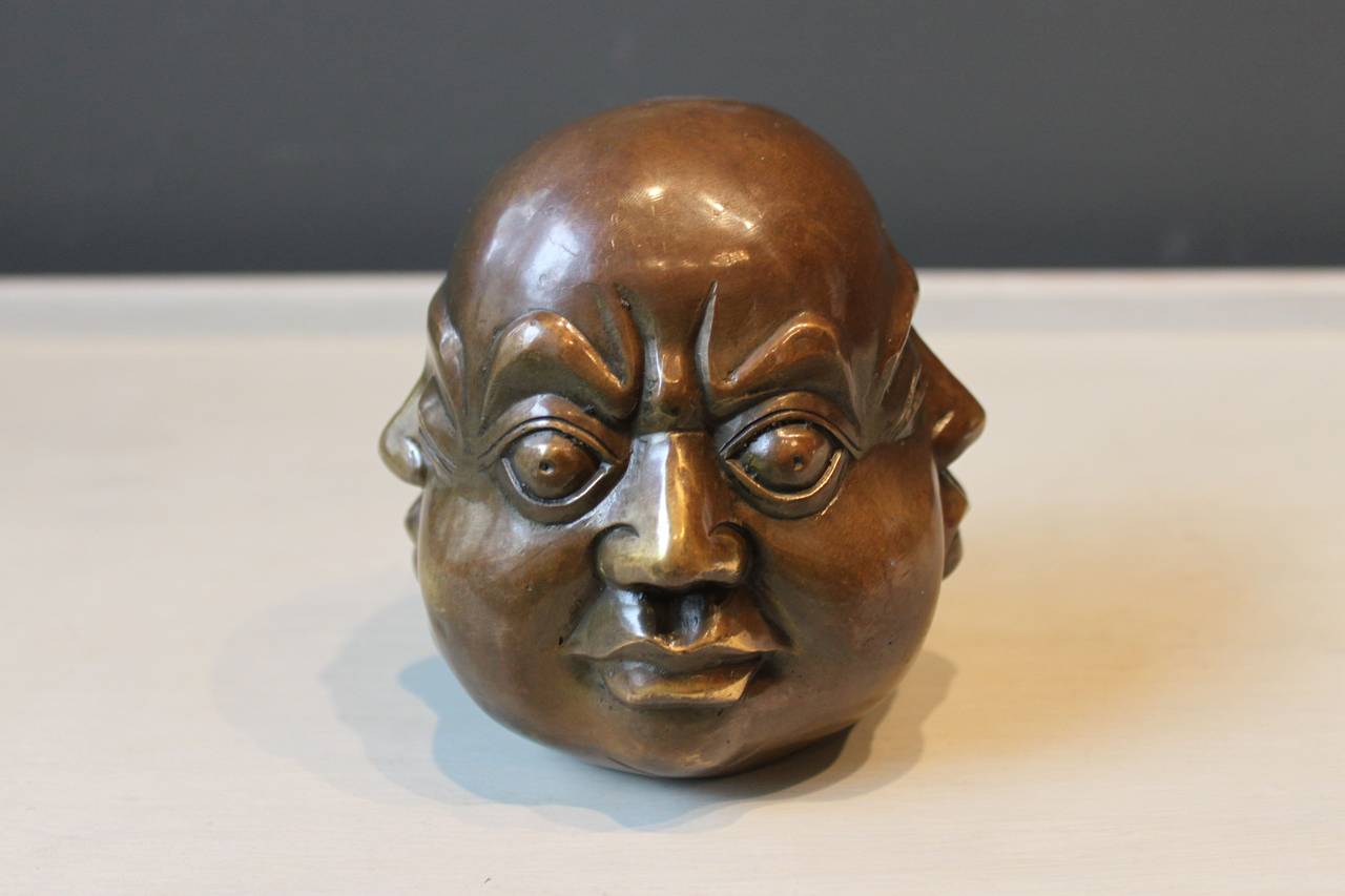 4 faced buddha head