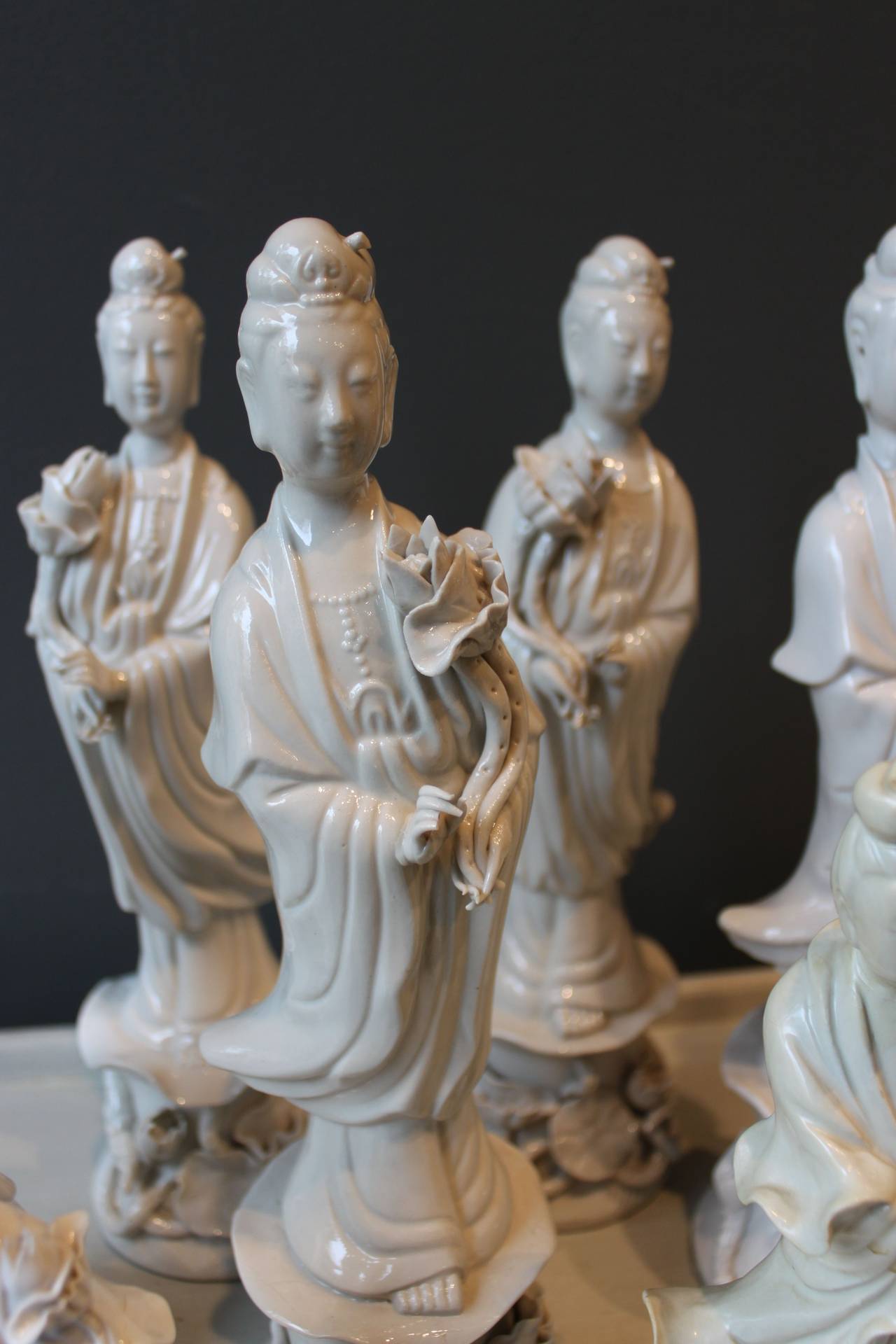 Chinoiserie Assembled Collection of Blanc de Chine Guanyins (Seven) For Sale