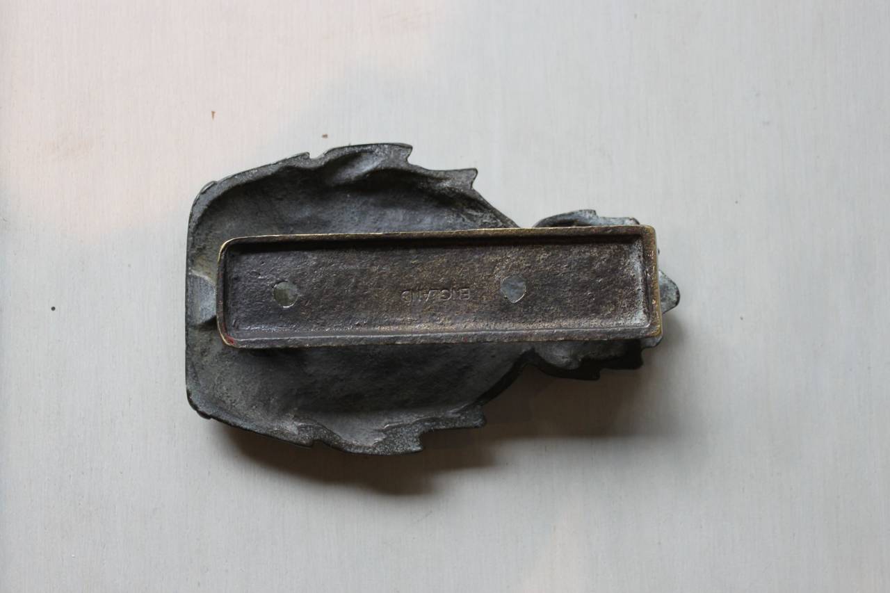 Substantial and heavy weight brass door knocker in the form of a pineapple with nice patina.  Stamped 
