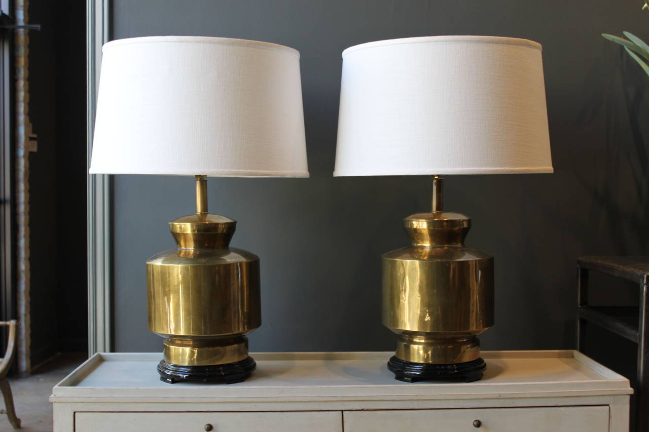 This handsome pair of brass Midcentury lamps are newly wired and measure 28