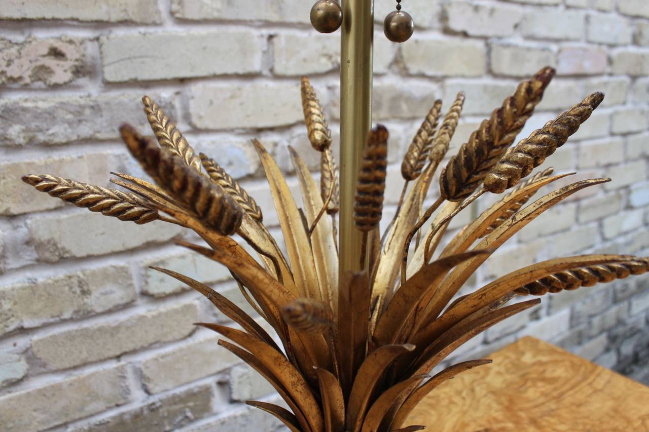 Lovely and impressive gilt and brushed brass wheat sheaf lamp by The Marbro Lamp Company, mid-20th century. Includes a new ecru silk shade and the original finial. The height of the lamp to the top of the shade is 39