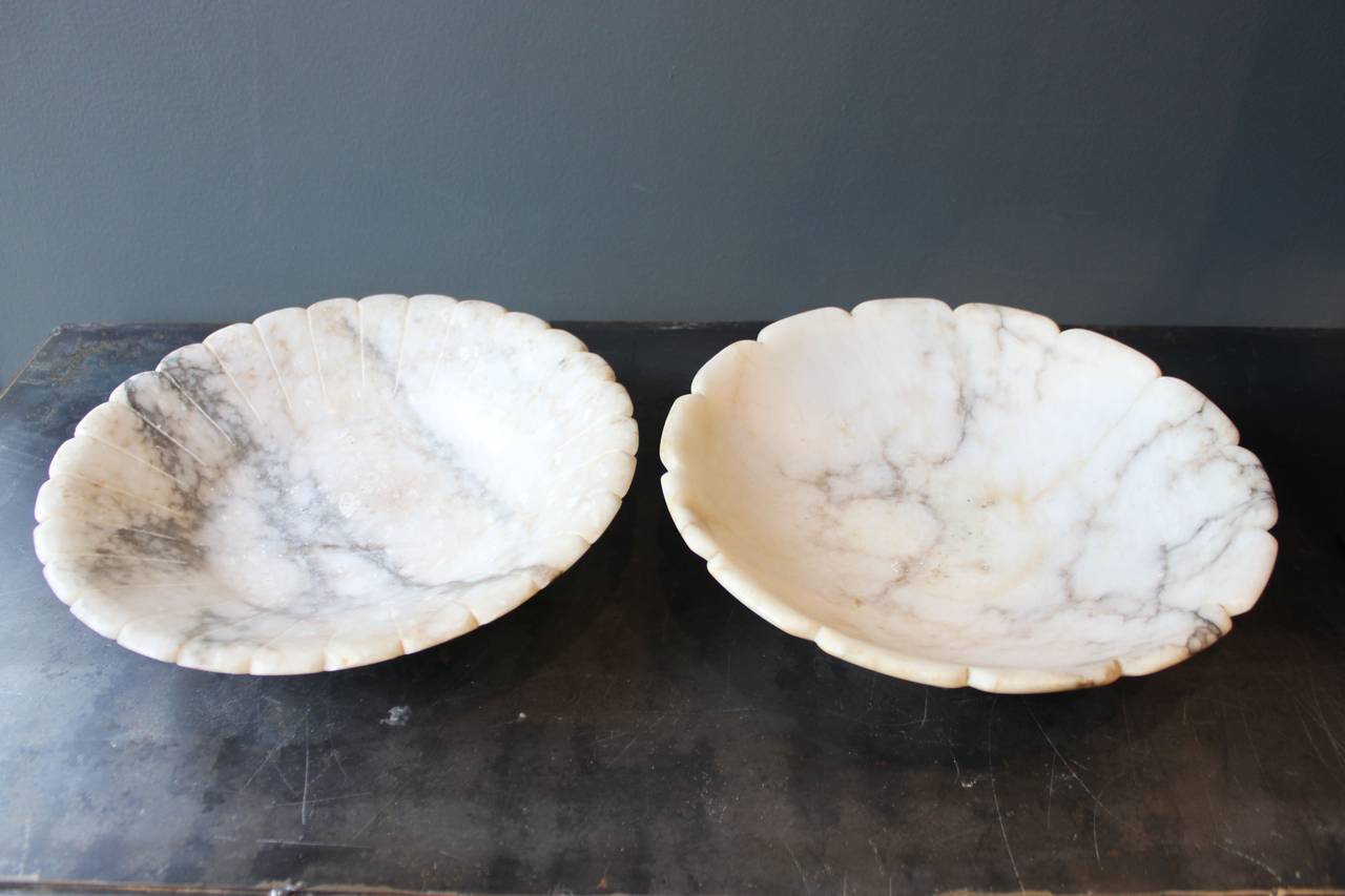 Two lovely carved white Carrara marble footed bowls. The largest is 12