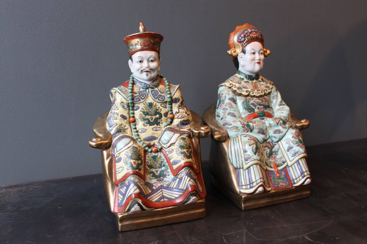 Polychrome Chinese Porcelain Seated Figures of a Man and Woman 1