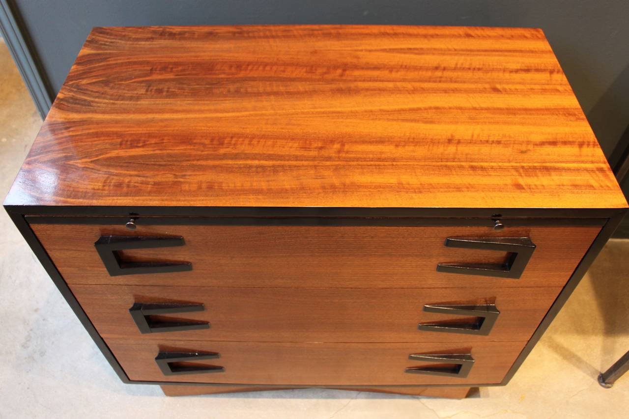 Handsome secretary or desk with chest of drawers beneath and nice ebonized wood detail. Marked 