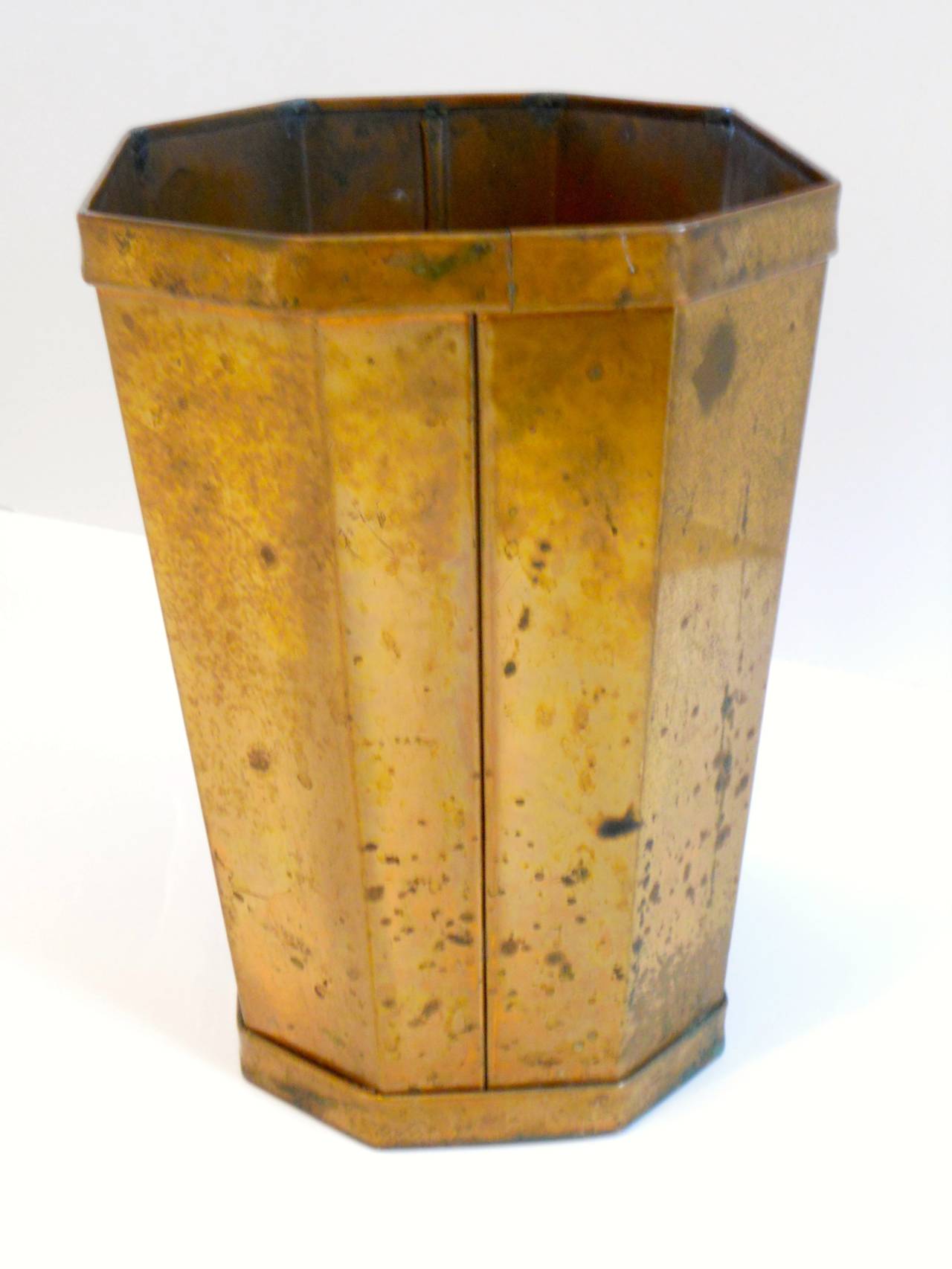 Charming copper waste bin or trash can with great pagination throughout.