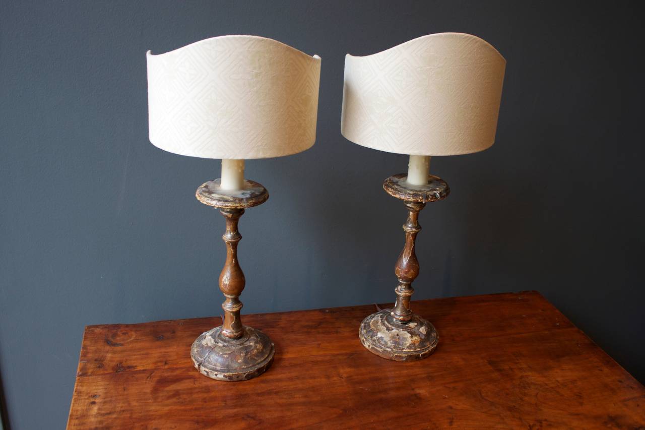 Pair Of 18th Century Italian Wood Candlestick Lamps With Custom Pair Of 18th Century Italian Wood Candlestick Lamps With Custom Fortuny Shades In Distressed Condition For
