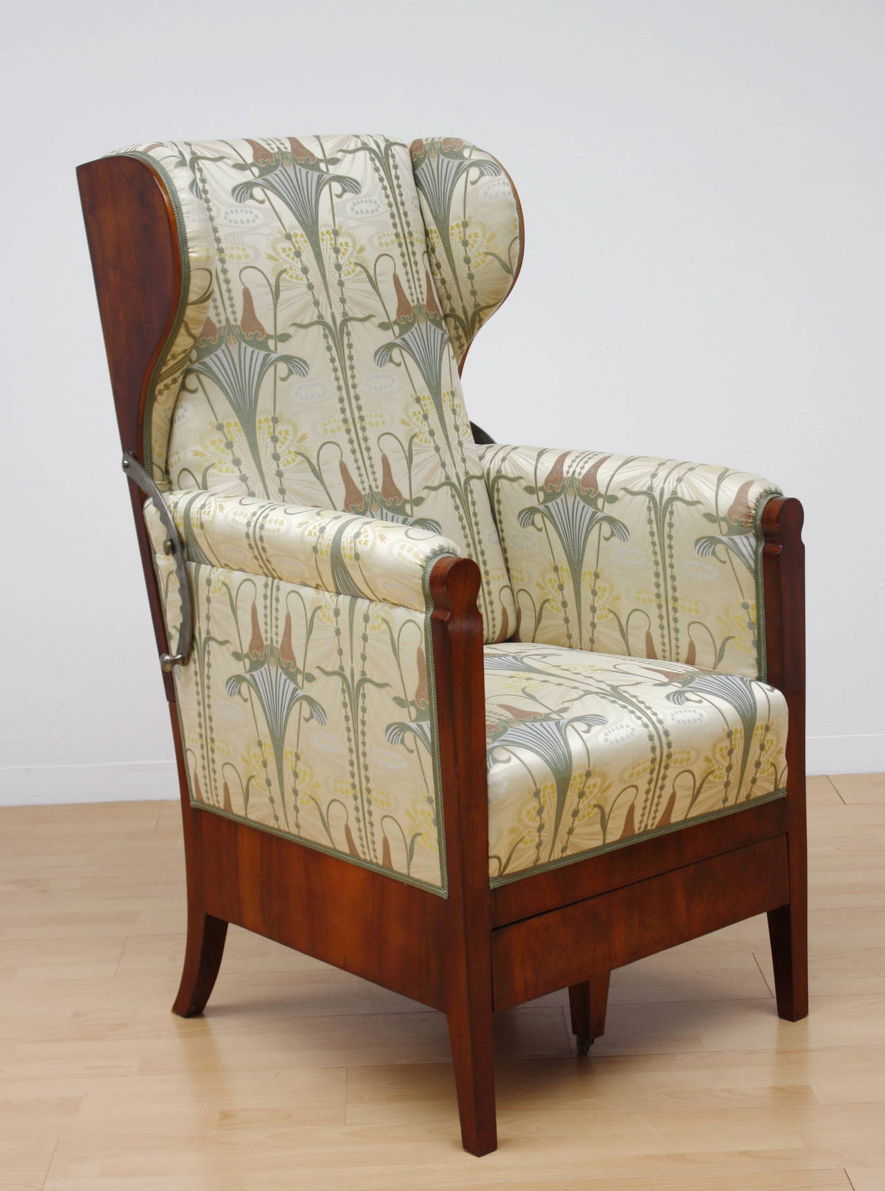 Rare Austrian Biedermeier high back wing chair, metamorphic Reclining Armchair. The foot Extension fits under the seat, the back reclines to varying degrees against a removable bar.