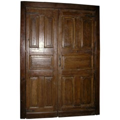 Used door in brown oak, double wing and frame, saloon opening push/pull, '700