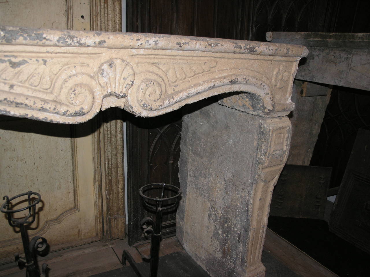 Antique fireplace made of borgogna's stone.