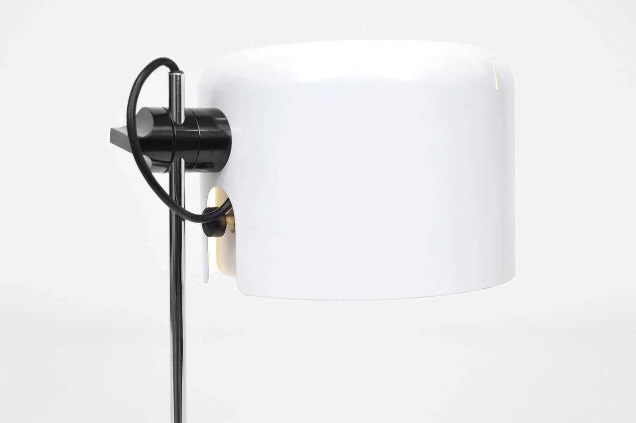 Coupe table lamp model 2202 by Joe Colombo for Oluce, Italy 1967. Early production with the old switch. White lacquered metal shade and base, chrome plated stem. Adjustable in height and position. Much beautiful details. In perfect original