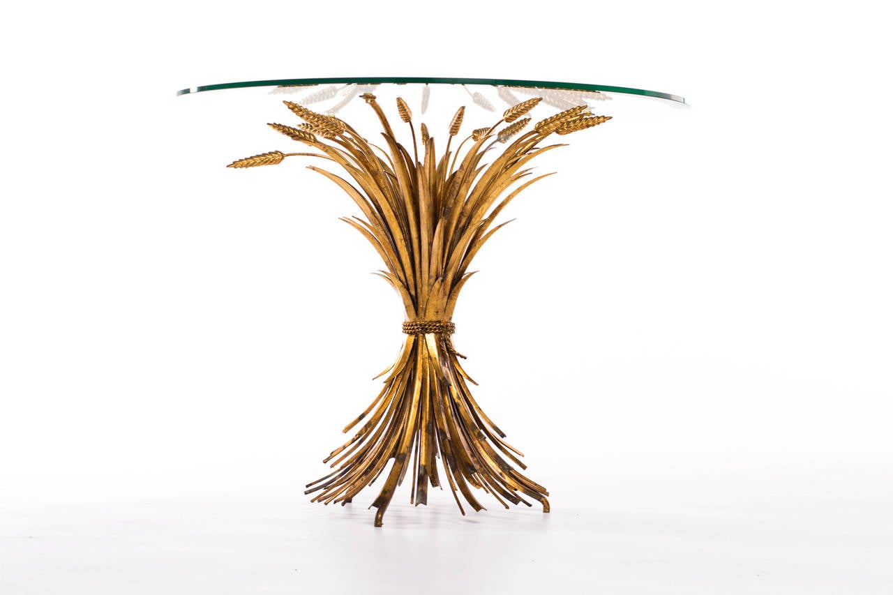 ‘Sheaf of Wheat’ side table, France 1970’s. High quality an detailed example with a very beautiful warm gold plated finish. This table became iconic when both Coco Chanel and Yves Saint Laurent had it in their Paris interior, therefore it’s often