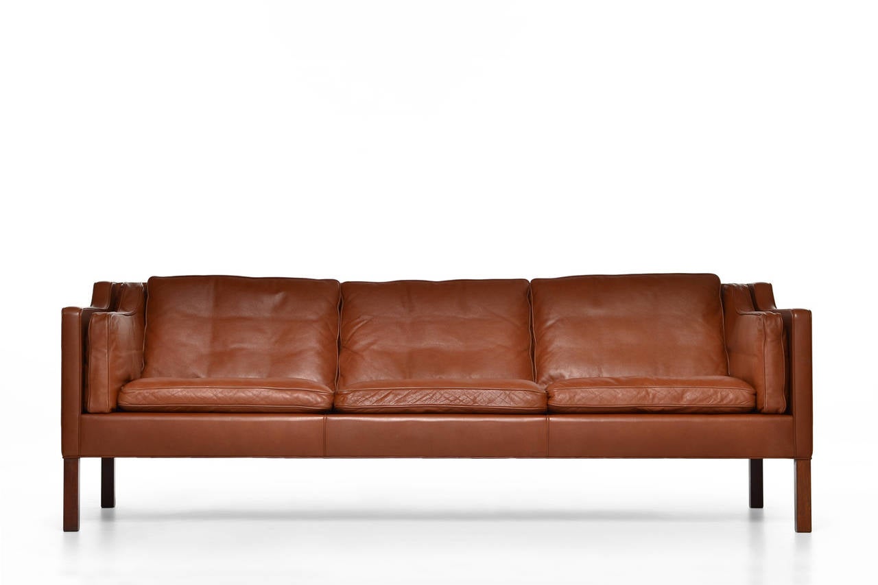 Beautiful sofa model 2213 by Børge Mogensen for Fredericia Stolefabrik, Denmark 1964. Original old production from the 1960's. The warm cognac color gives it a nice natural and Rich feeling giving a modern interior a Sophisticated twist. In