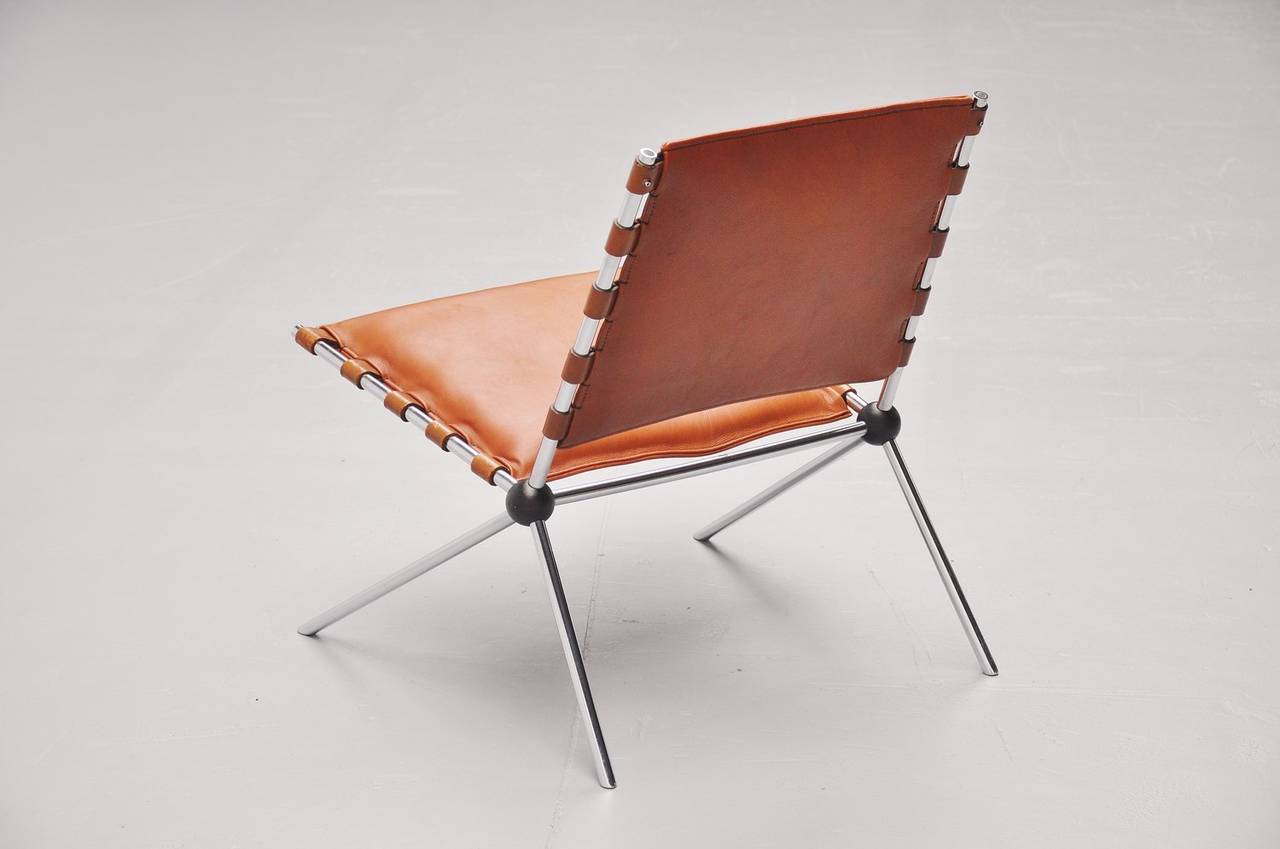 Ultra rare lounge chair model PSE58 designed by Paul Schneider von Esleben made by H.Kauffeld, Germany 1953. This chair was designed and made in 1953 for the Mannesmann-Hochhaus Dusseldorf, Germany. The chair has a solid chrome plated metal frame