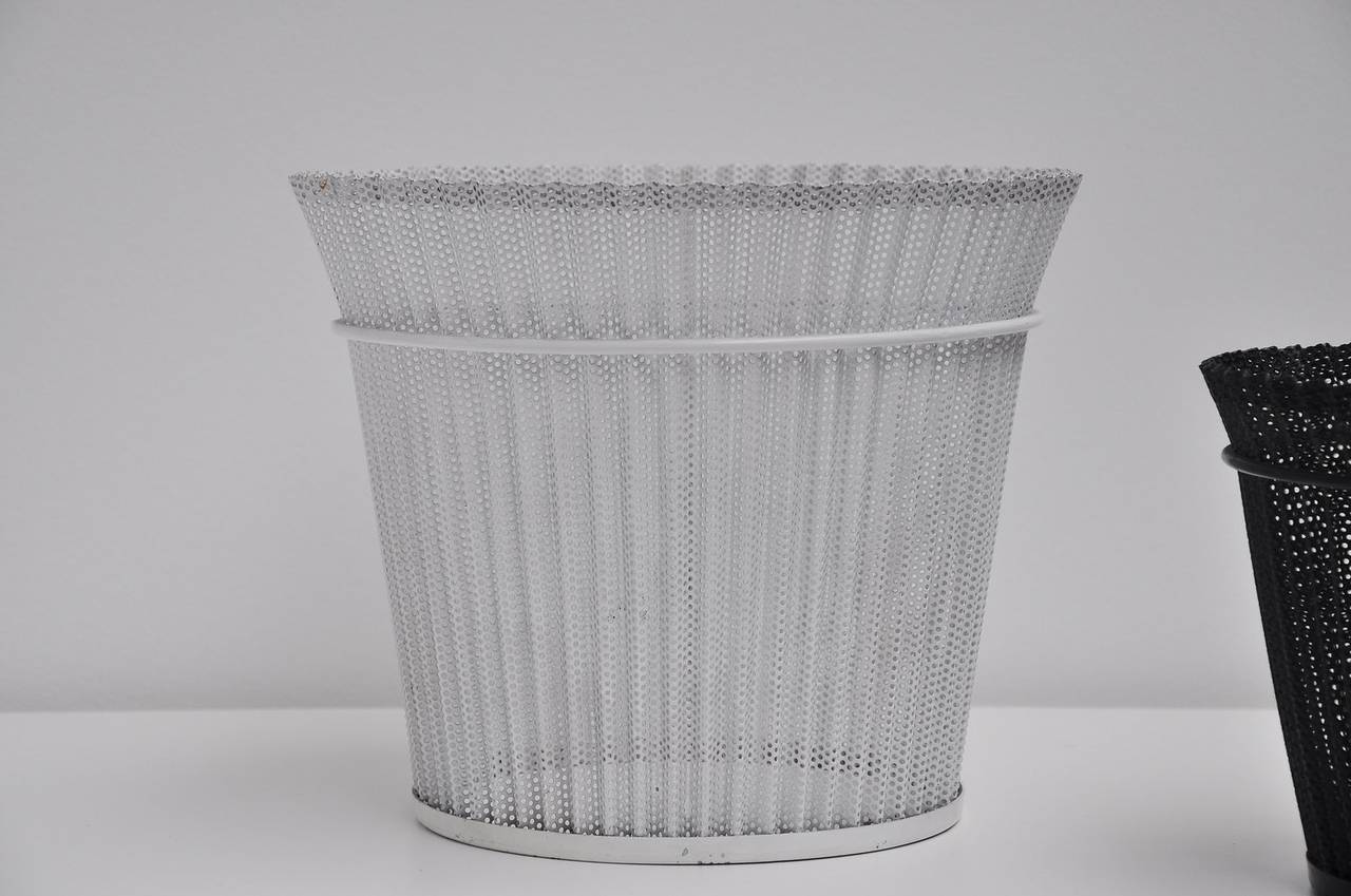 Very nice folded white metal basket designed by Mathieu Matégot for Artimeta Soest, 1955. A lot of people still doubt some items really are Matégot, but during the 1950s Matégot sold some rights to Artimeta to produce some products as Artimeta