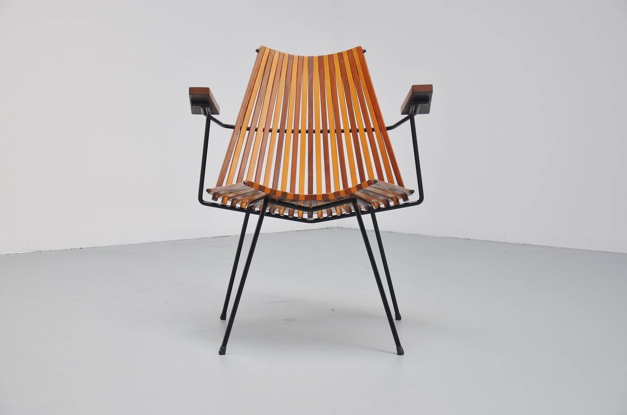 Fantastic lounge chair Model 220 designed by Dirk Van Sliedrecht for Rohé Noordwolde, Holland 1960. This chair was designed by Dirk Van Sliedrecht who was a very famous Dutch designer, but also an interior designer, teacher and academy director. He