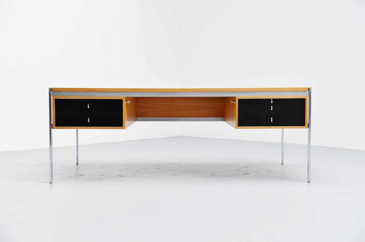 Superb large conference desk designed by Preben Fabricius & Jorgen Kastholm for Kill International, Germany, 1960. This very nice and early desk designed by Fabricius & Kastholm was made of birch wooden veneer and has black laminated drawers. The