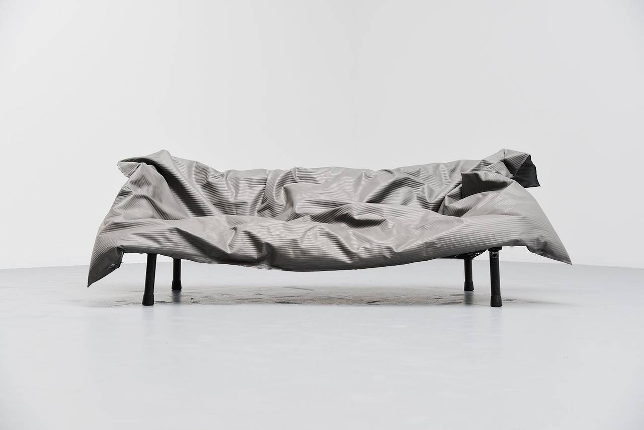 Rare sofa designed by Ron Arad for One/Off, United Kingdom 1985. This unique sofa has a klee klamp enameled steel frame, dark grey. And on top you see a PVC seating cushion filled with unexpanded polystyrene granules. The sofa is in completely