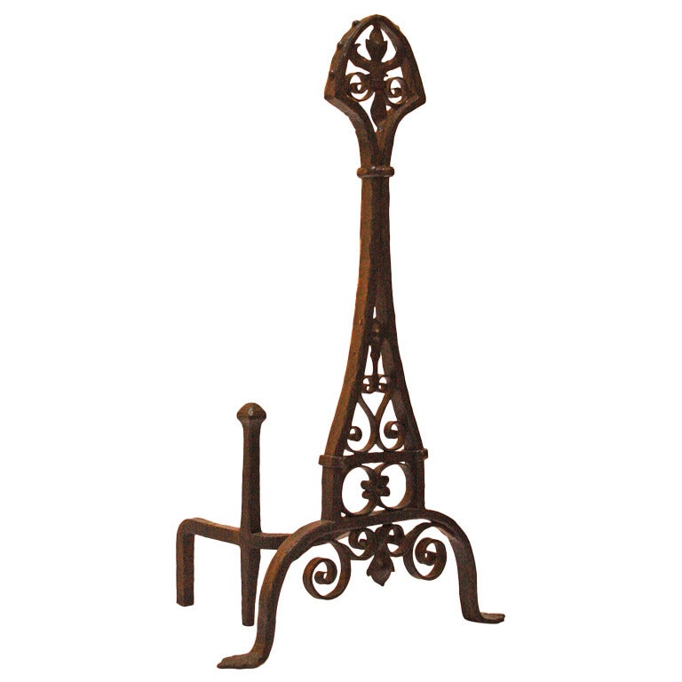 Fleur-de-lis articulated wrought iron Art Deco andirons with leaf paw feet.