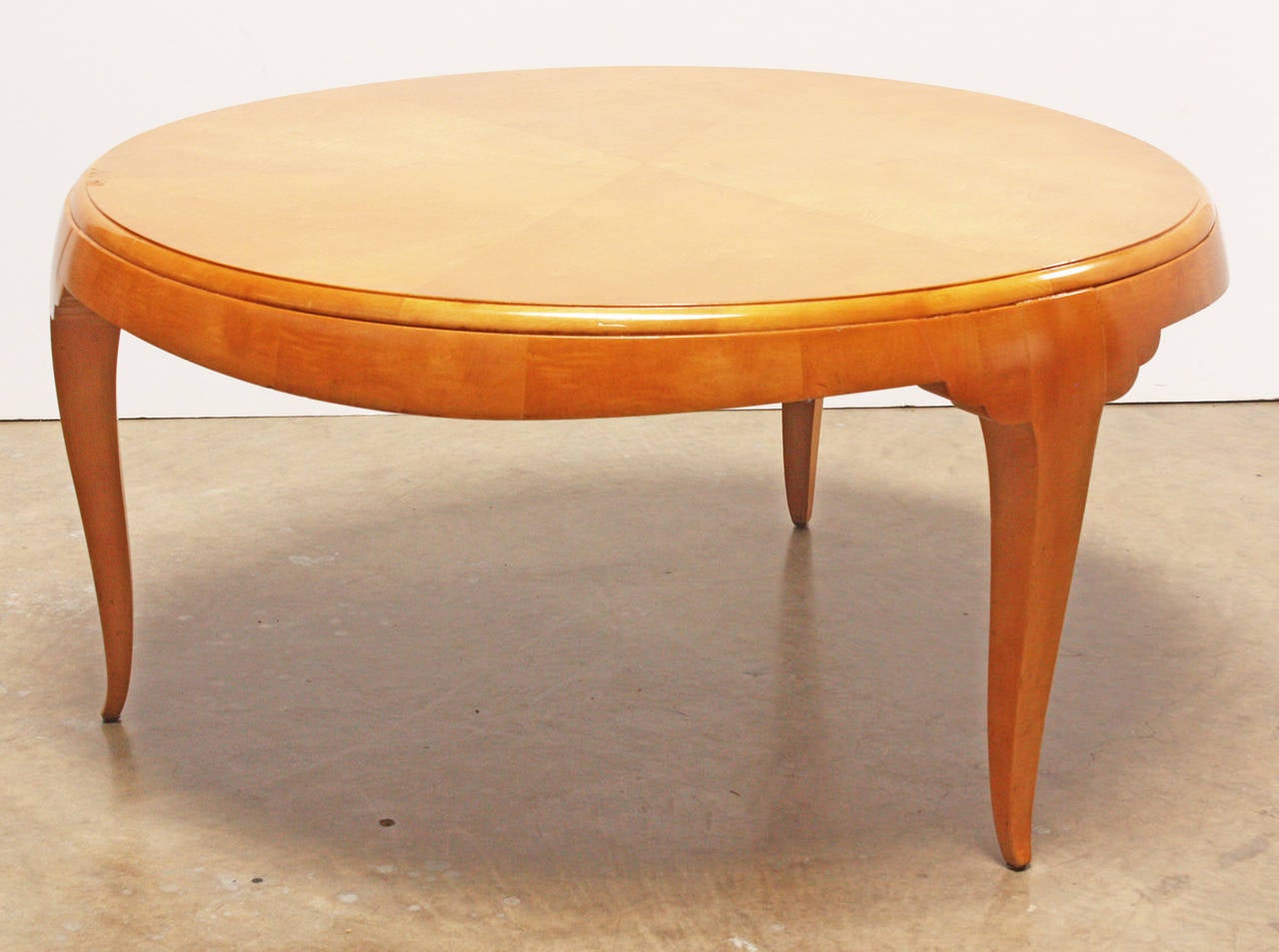 Moderne round coffee table, signed by 