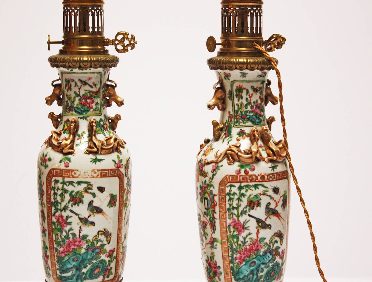 Chinese Export Pair of Antique Rose Medallion Lamps with Bronze Bases
