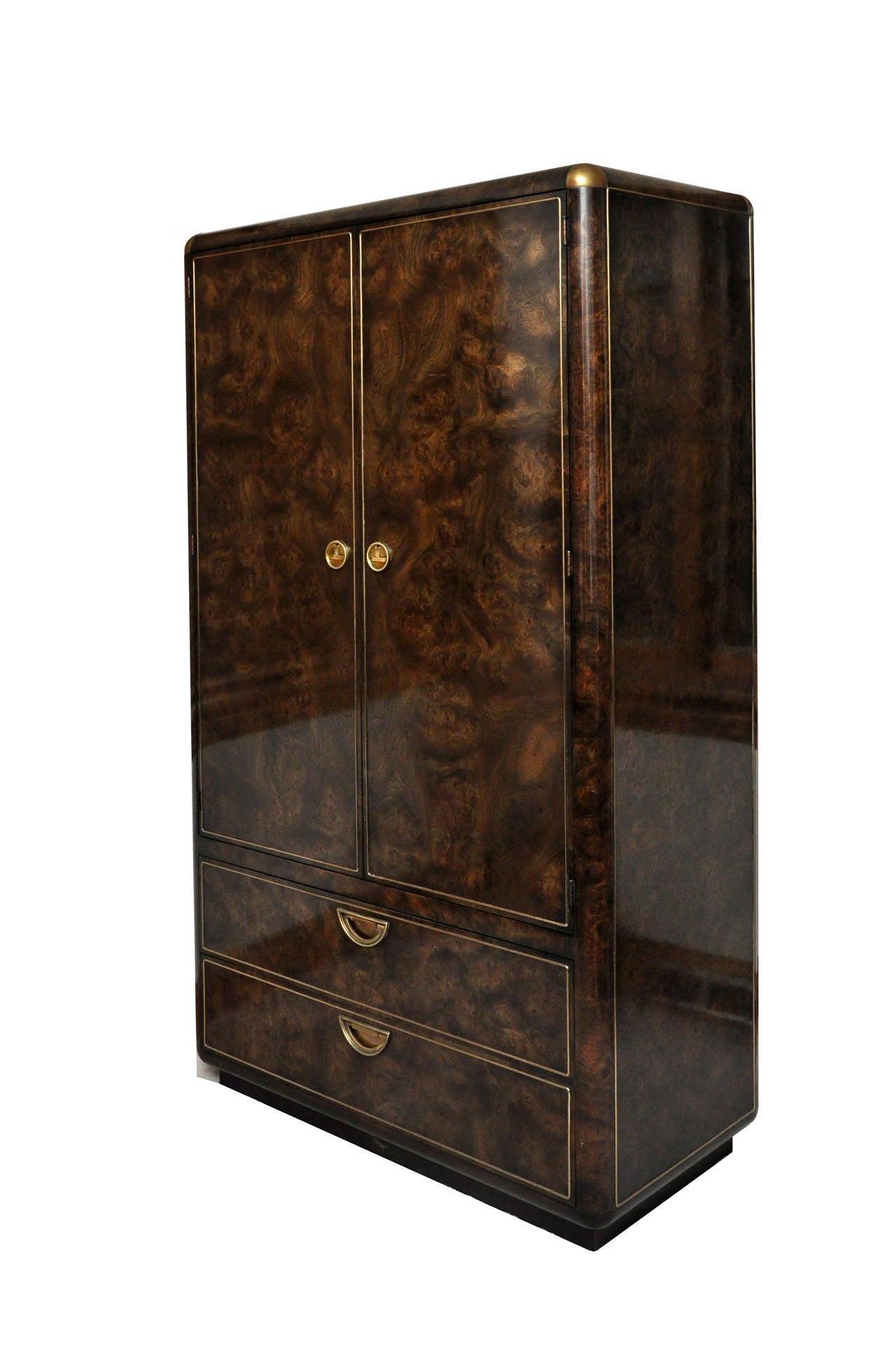 Beautiful Mastercraft Burled Amboyna Armoire with inlaid brass trim and handles. 

Interior has an open shelf storage area with four (4) full length drawers, in addition of the two (2) full length drawers on the exterior (base). 

In excellent
