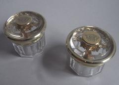 An exceptionally fine 
unusual pair of silver gilt mounted Dressing Table Boxes