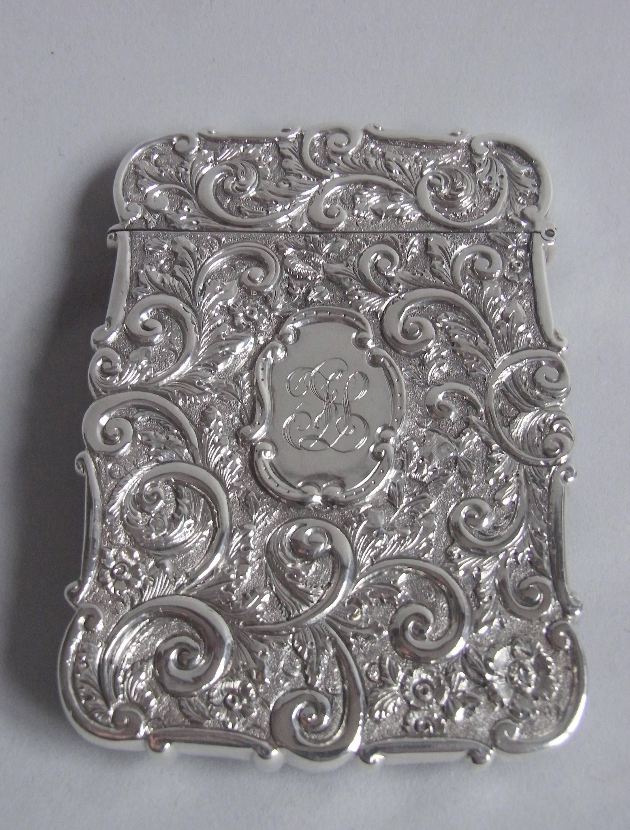 The card case is broad rectangular in form and displays a very rare detailed crisp view of York Minster, in high relief. The scene is surrounded by foliate scrolls and flower heads on a matted ground. The reverse is also chased with scroll work,