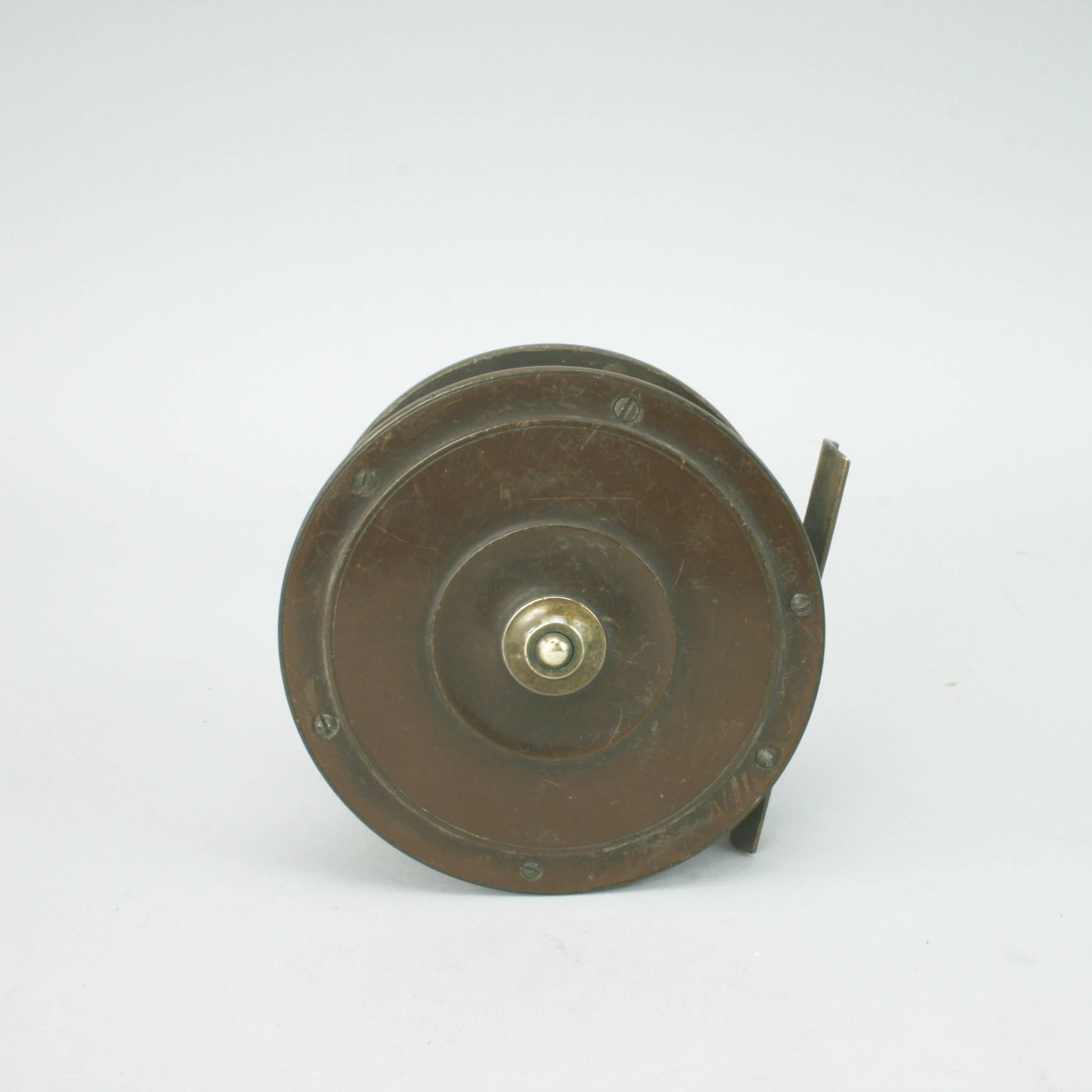 A good early London pattern Salmon fly fishing reel made from bakelite and brass with horn handle and some original silk line. This reel is very attractive with it's unpolished finished and in original condition.

 