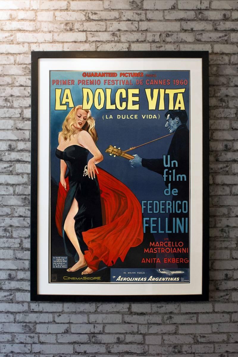 La Dolce Vita è un film commedia-drammatico italiano del 1960 diretto e co-sceneggiato da Federico Fellini. Il film segue Marcello Rubini, un giornalista che scrive per riviste di gossip, durante sette giorni e notti di lavoro. 

Imbottitura in