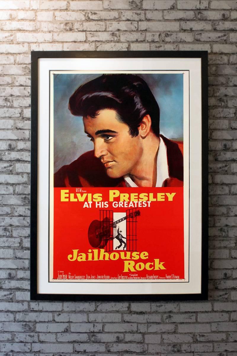 The hair, the profile, the guitar, this poster from one of the King's most popular films includes all the images that the public has come to associate with the young, charismatic Elvis Presley. Material from his pre-military service films, and