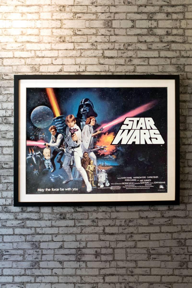 This is the super rare pre-Oscars version of the sought after UK quad with artwork by Tom Chantrell. George Lucas commissioned leading UK artist Chantrell to create this design, which also ran as the US style 'C' design. This particular poster was