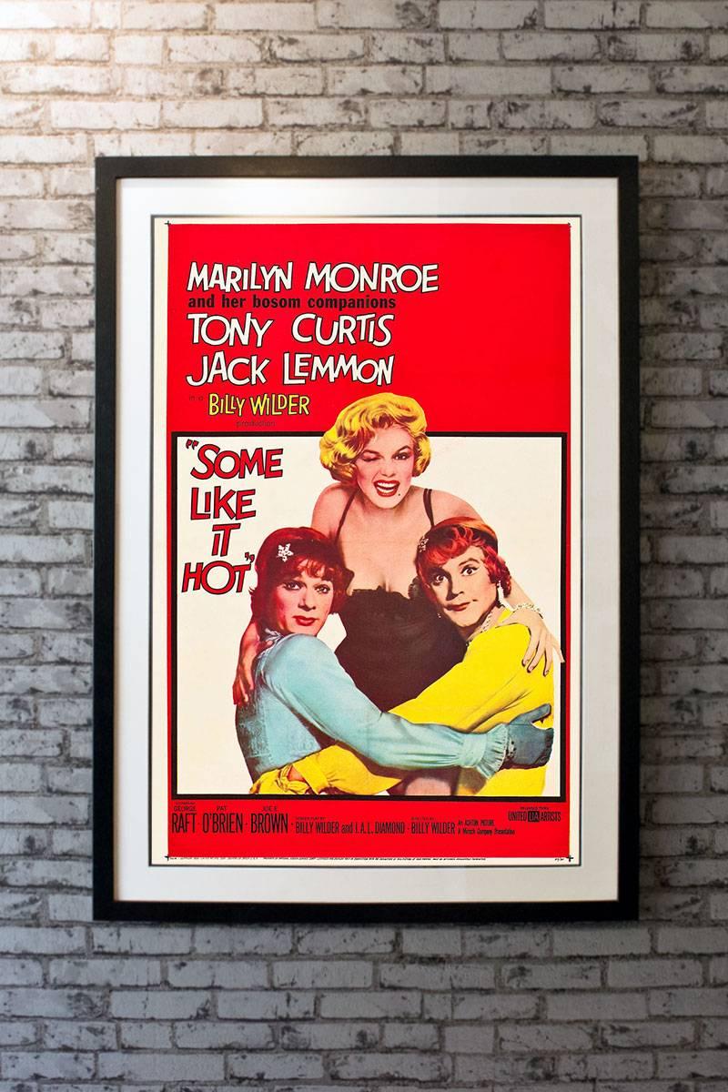 A Classic poster from a timeless comedy, this one sheet features. Marilyn Monroe at her best as singer Sugar Kane. In this silly, top grossing comedy directed by Billy Wilder, Tony Curtis and Jack Lemmon try to avoid the mob by hiding out in drag
