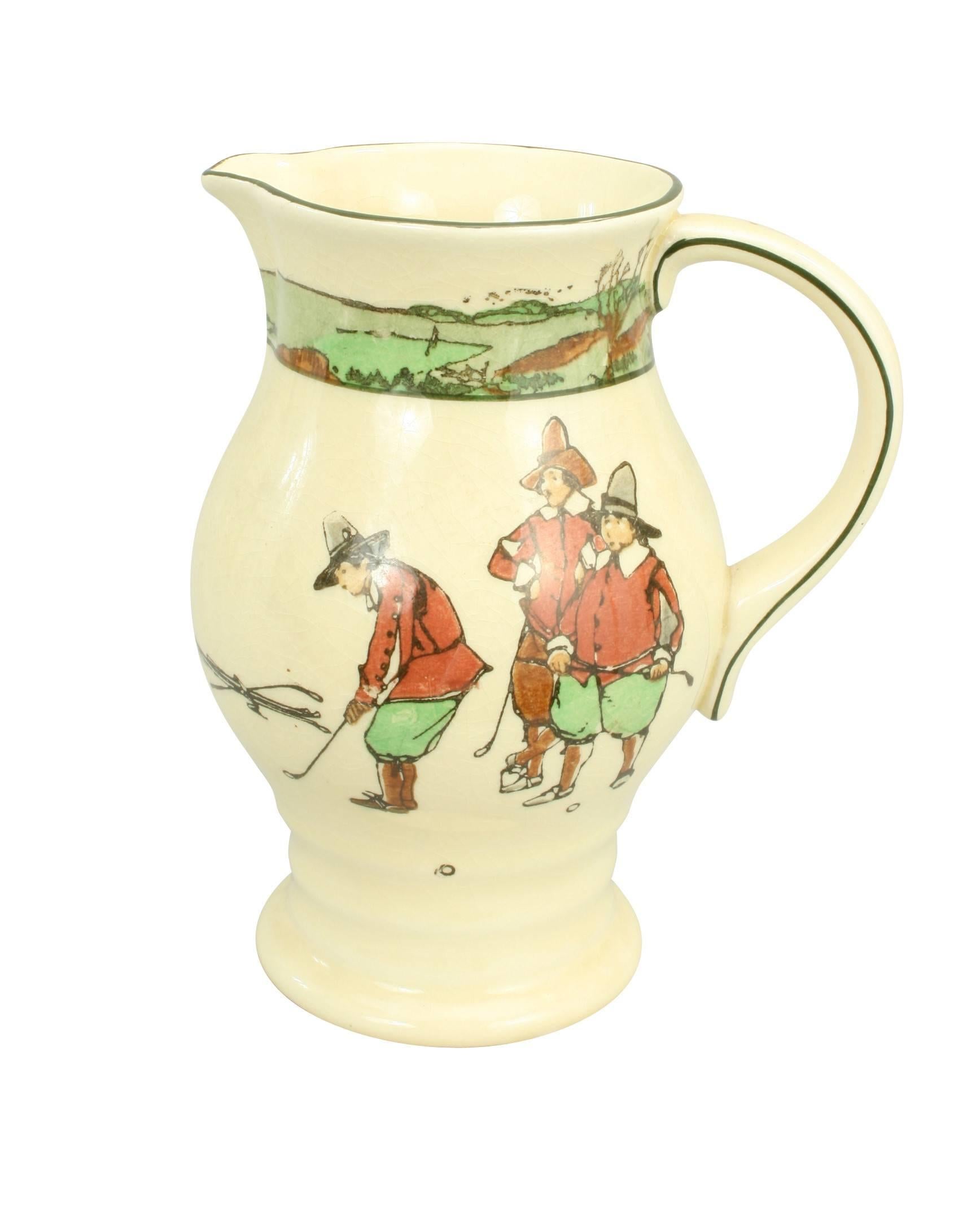 A Royal Doulton jug with polychrome golf scenes by Charles Crombie. 
Charles 'Chas' Crombie (1885-1967) was an illustrator whose work is well-known to the collector. His pictures can be found in many forms, on postcards, calendars, in books and on