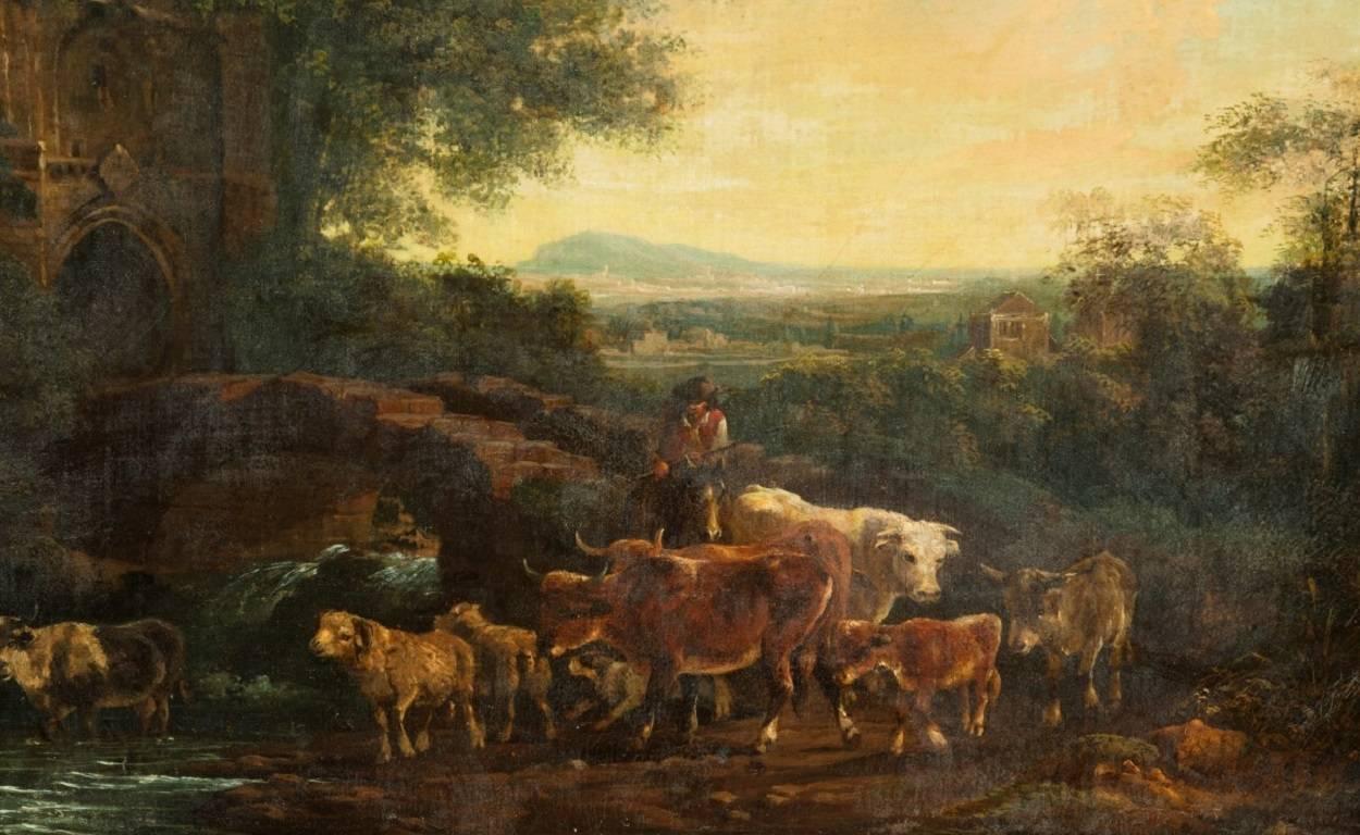 Anglo-French school oil on canvas painting of cows in an Italianate landscape in a carved wood frame. 
Possibly by Philip de Loutherbourg.