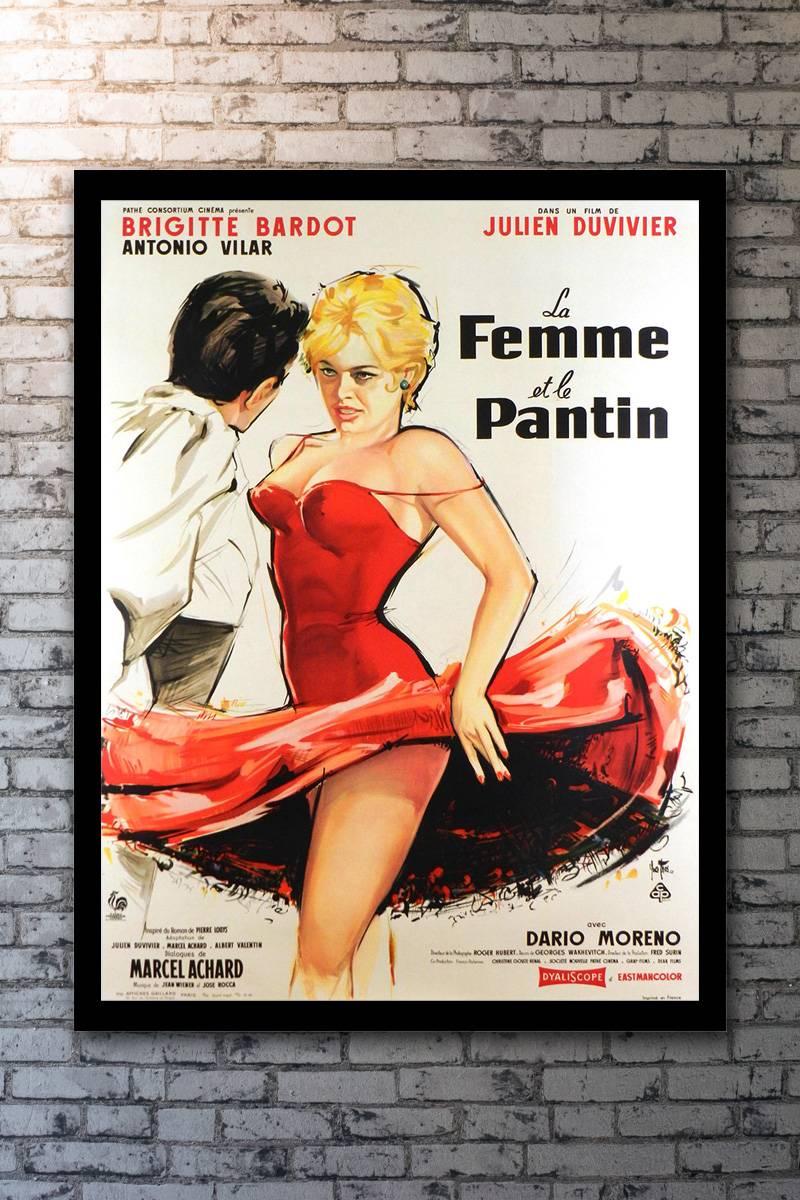 Starring Brigitte Bardot, Antonio Vilar, Dario Moreno, and Lila Kedrova. Directed by Julien Duvivier. An unrestored poster with good color and an overall very presentable appearance. Gorgeous artwork by Yves Thos.

Framing options:
Glass +