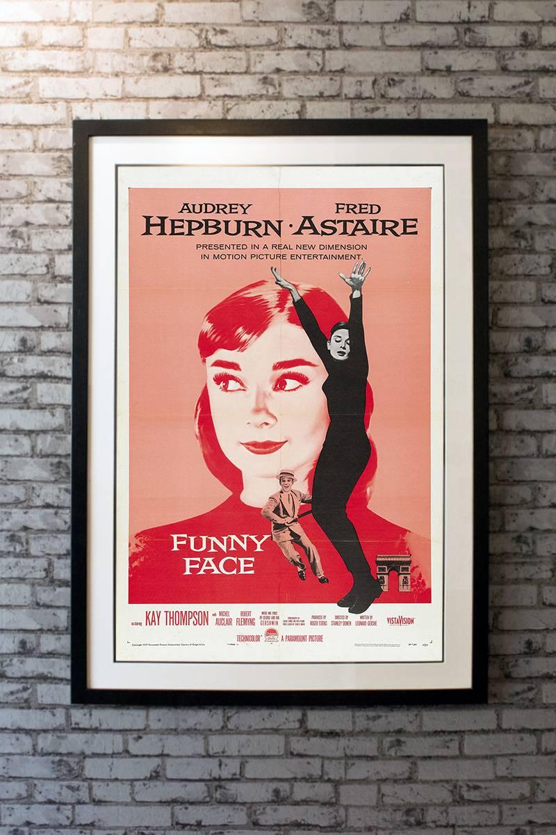Dispatched on an assignment, New York City-based fashion photographer Dick Avery (Fred Astaire) is struck by the beauty of Jo Stockton (Audrey Hepburn), a shy bookstore employee he's photographed by accident, who he believes has the potential to