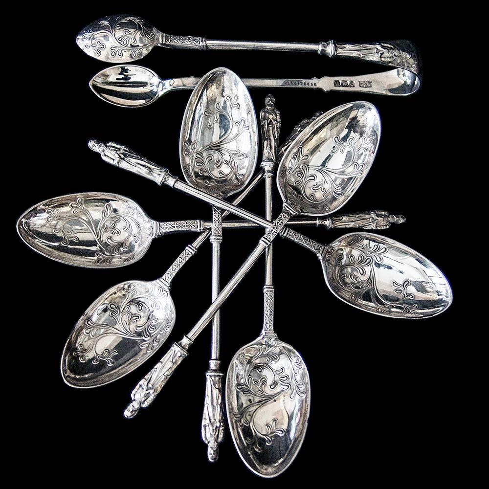 A very interesting set of six decorative teaspoons with pair of matching sugar tongs all in original presentation case. The bowls decorated with raised floral design and the handles having 'Apostle' terminals. Each piece also stamped with the
