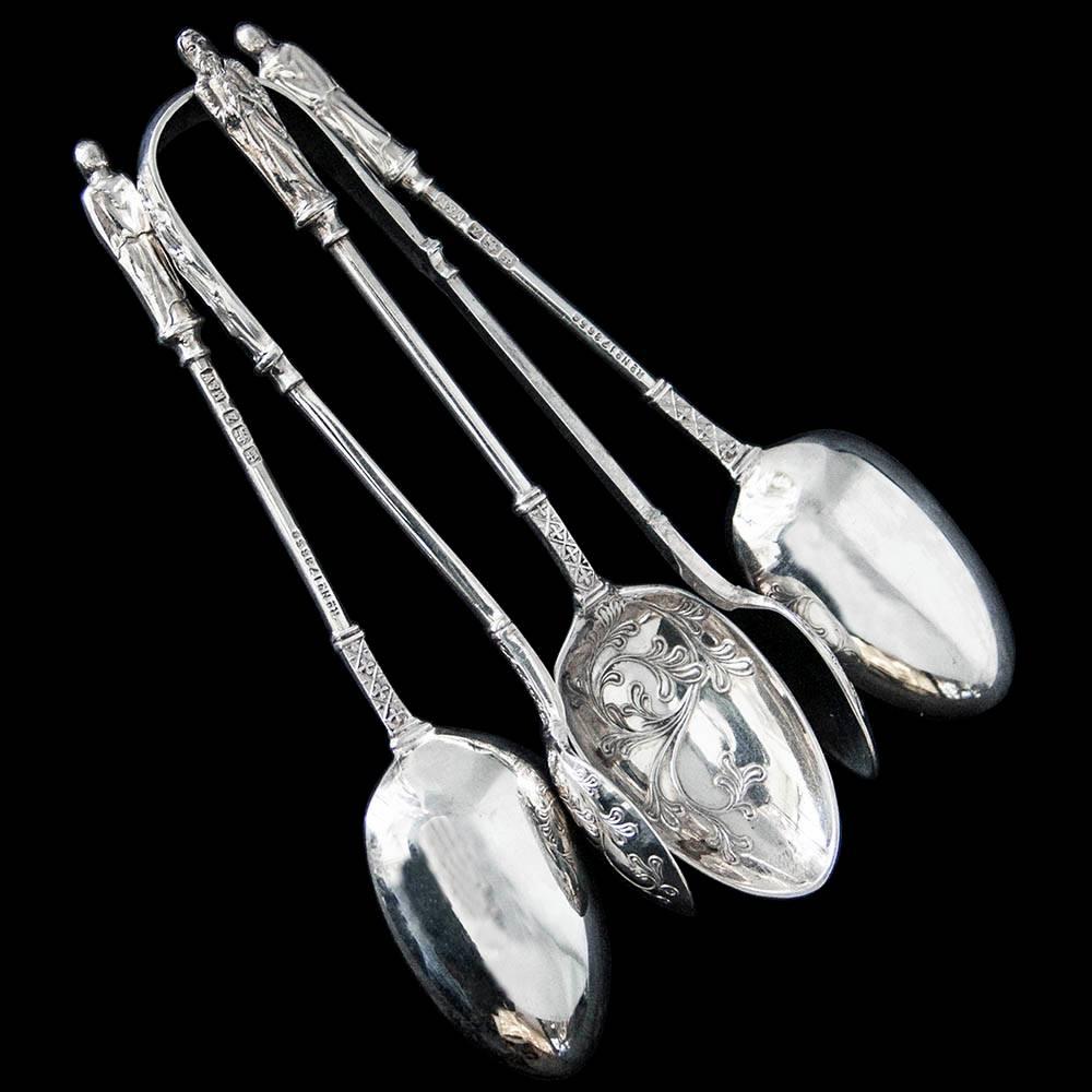 English Cased Set of Victorian Silver Decorative Teaspoons with Sugar Tongs