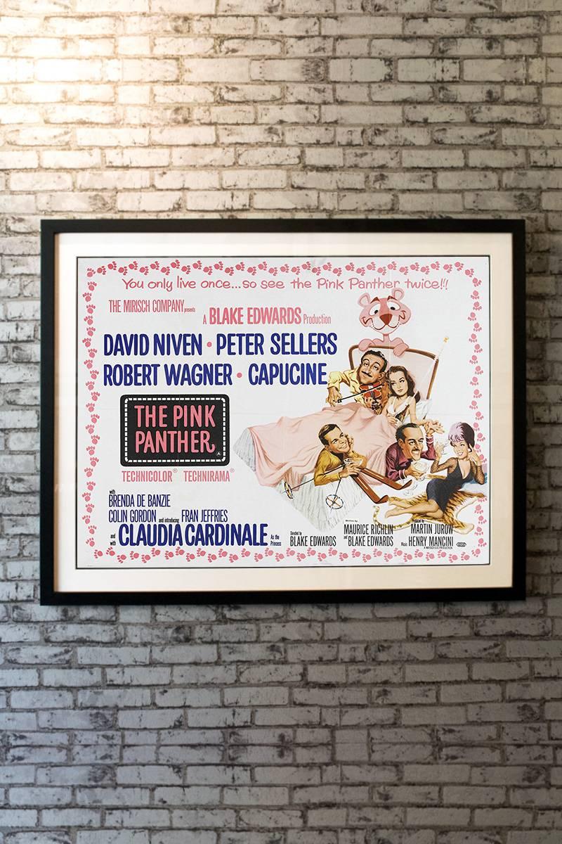 The Pink Panther is a 1963 American comedy film directed by Blake Edwards and co-written by Edwards and Maurice Richlin, starring David Niven, Peter Sellers, Robert Wagner, Capucine and Claudia Cardinale. 

Linen backing + £150

Framing