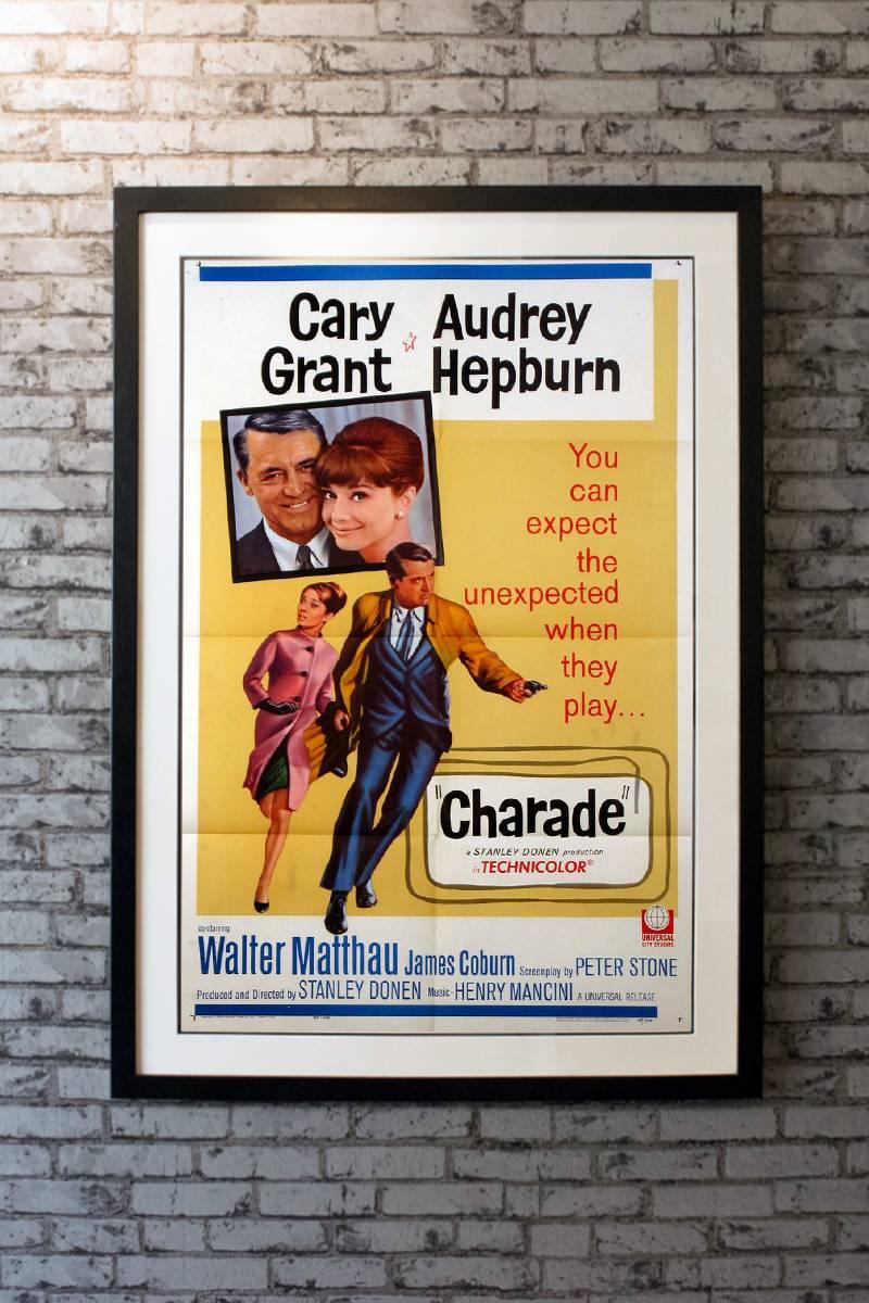 After Regina Lampert (Audrey Hepburn) falls for the dashing Peter Joshua (Cary Grant) on a skiing holiday in the French Alps, she discovers upon her return to Paris that her husband has been murdered. Soon, she and Peter are giving chase to three of