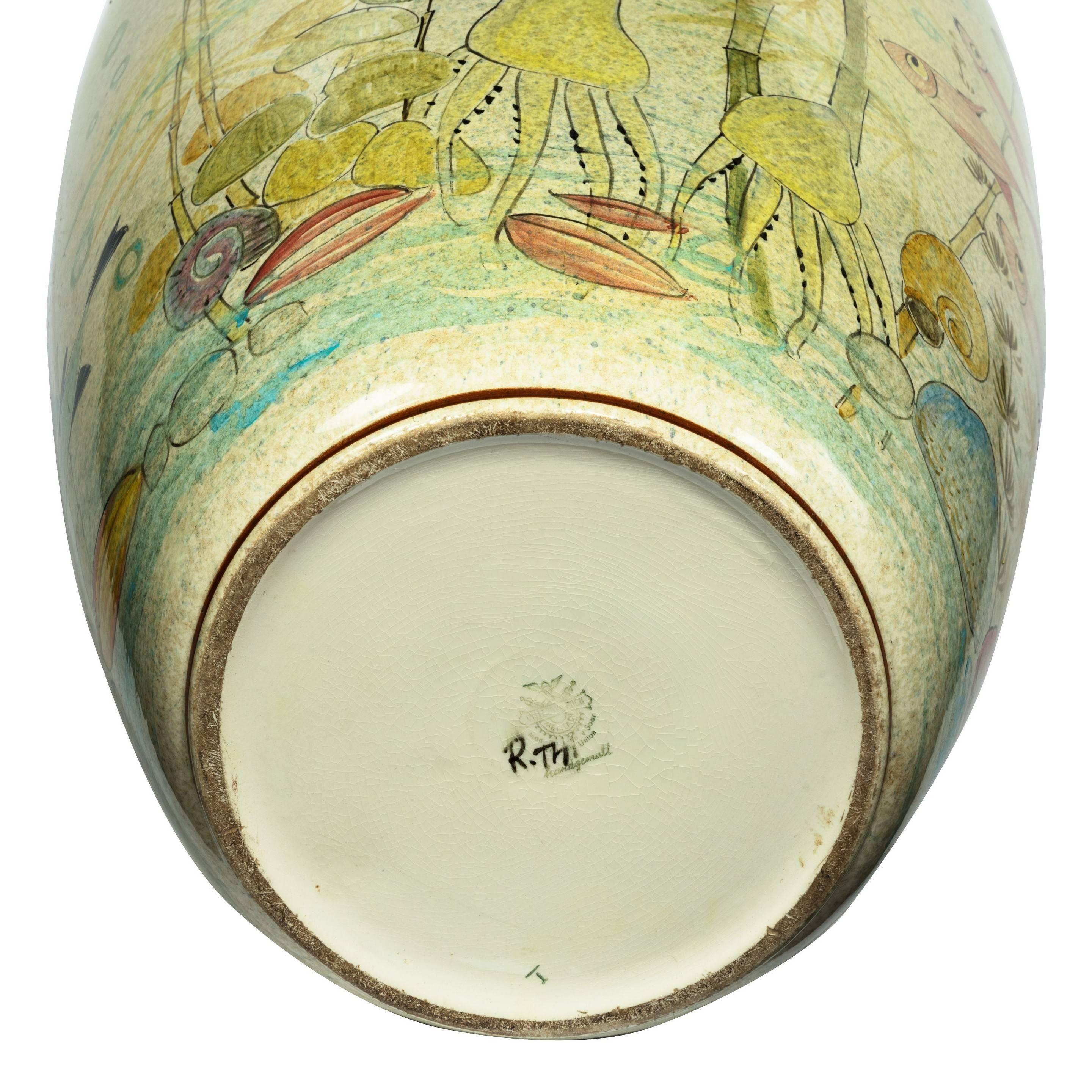 A rare and unusual hand-painted floor vase by Villeroy & Boch, 

The ovoid body naively painted with fish, shells, octopus and sea horses in an underwater seascape, stamped ‘Villeroy & Boch, Mettlach, made in France-Saar Economic Union’ and