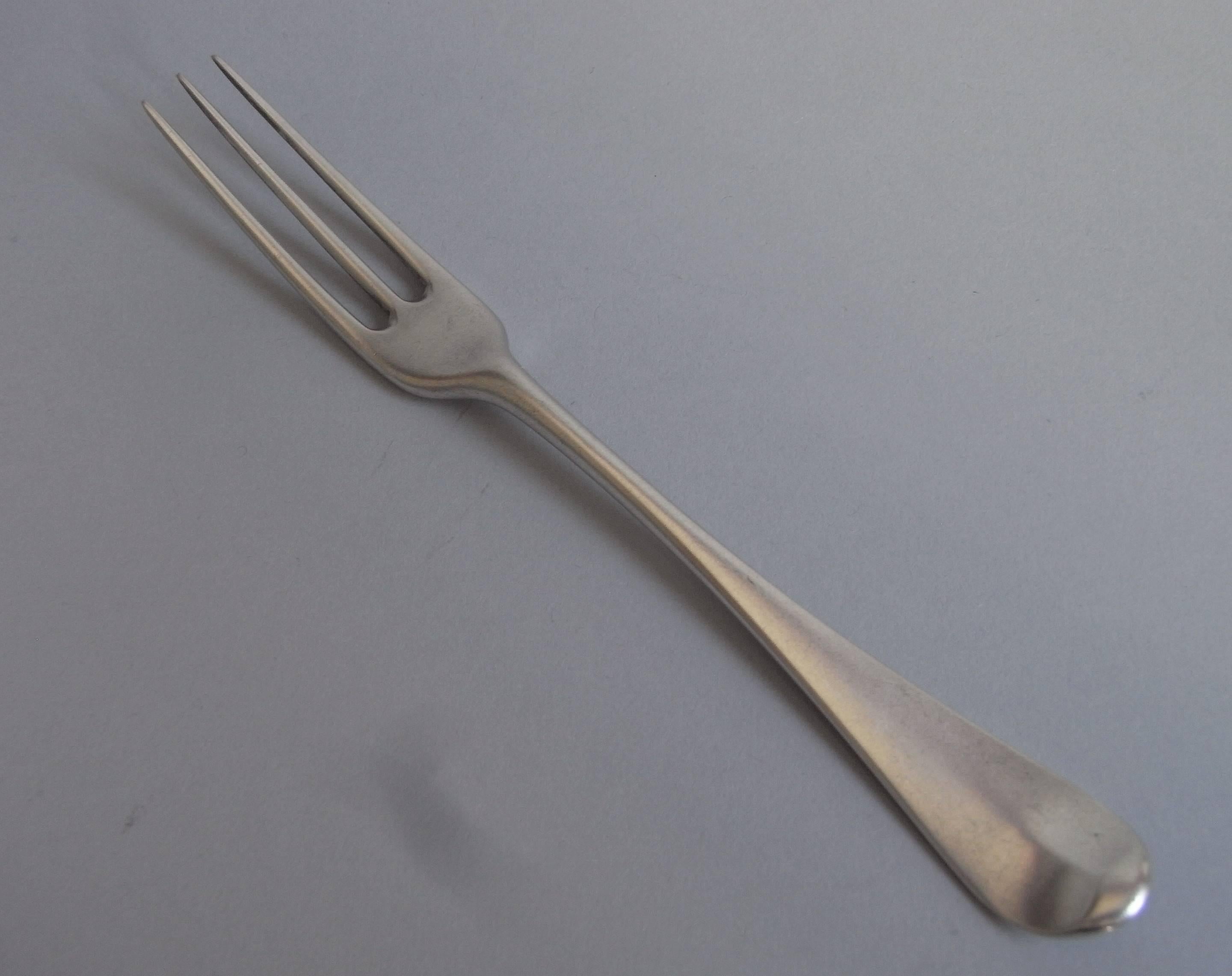 The table forks are modelled in the rare Hanoverian three prong style, with elegant long tines. The reverse of each is engraved with the contemporary script initial 