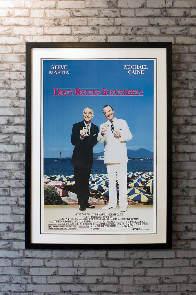 Con artist Lawrence Jamieson (Michael Caine) is a longtime resident of a luxurious coastal resort, where he enjoys the fruits of his deceptions, that is, until a competitor, Freddy Benson (Steve Martin), shows up. When the new guy's lowbrow tactics