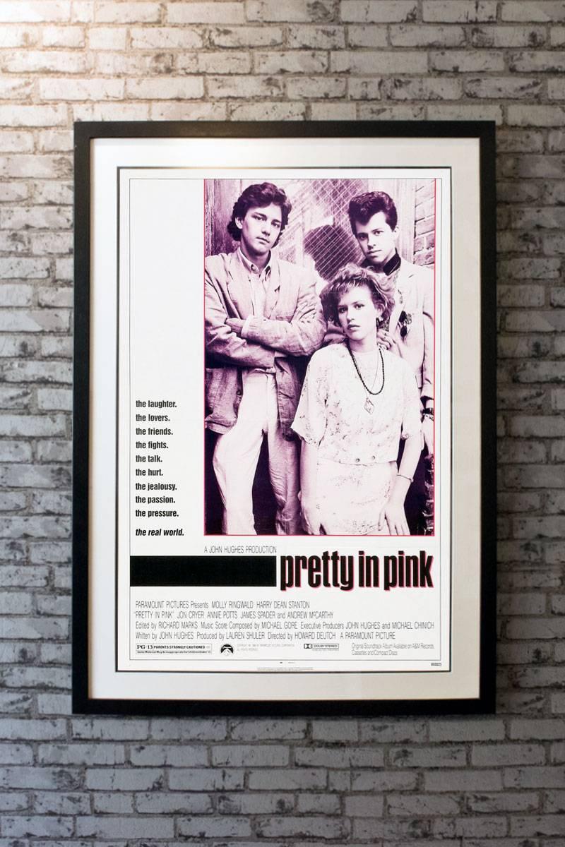 Classic 1980s John Hughes comedy starring Molly Ringwald as poor girl who must choose between the affections of her doting childhood sweetheart and a rich but sensitive playboy.

Linen-backing + £150

Framing options:
Glass and single mount +