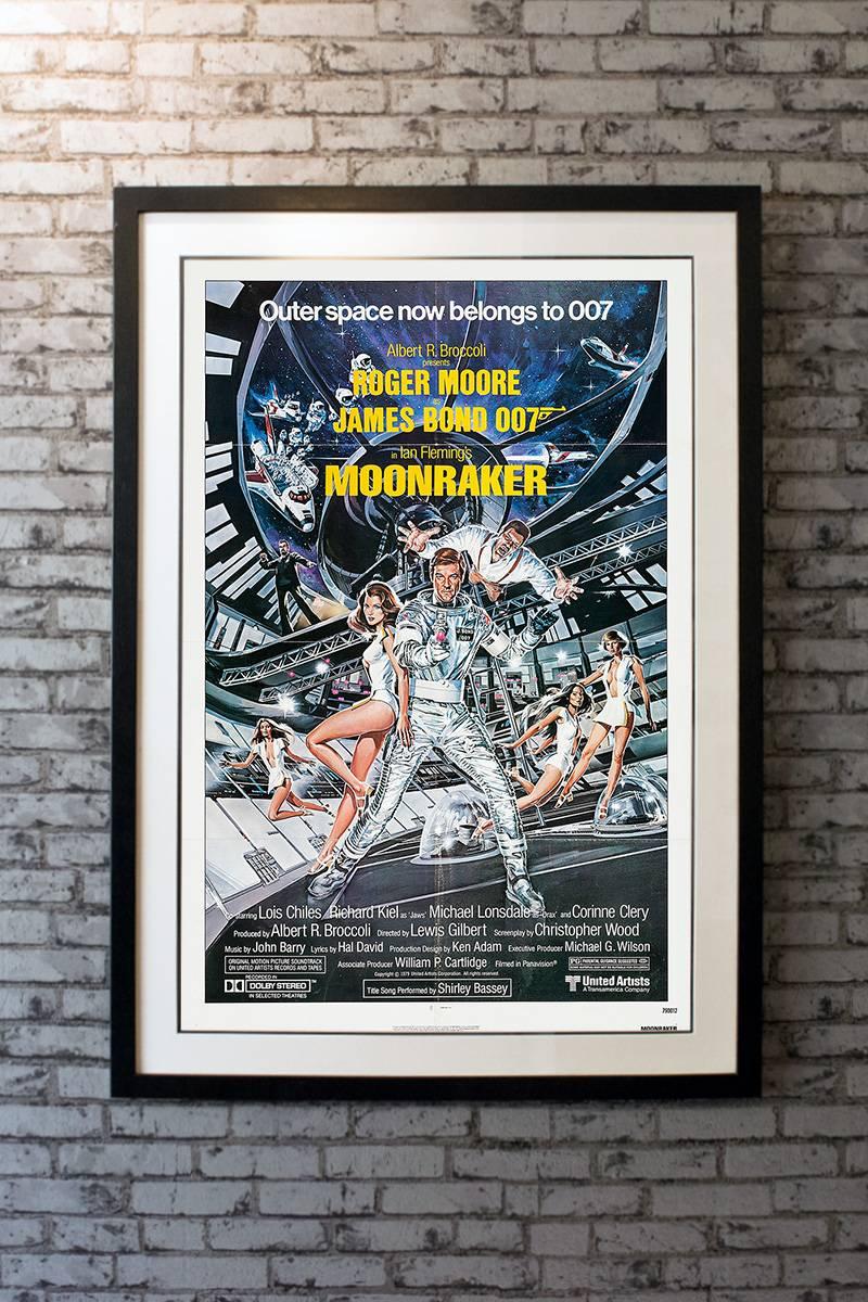 James Bond blasts off into outer space for this action epic that pits the forces of England against a maniac who plans the extinction of man! 

Linen-backing + £150

Framing options:
Glass and Single Mount + £250
Glass and Double Mount +