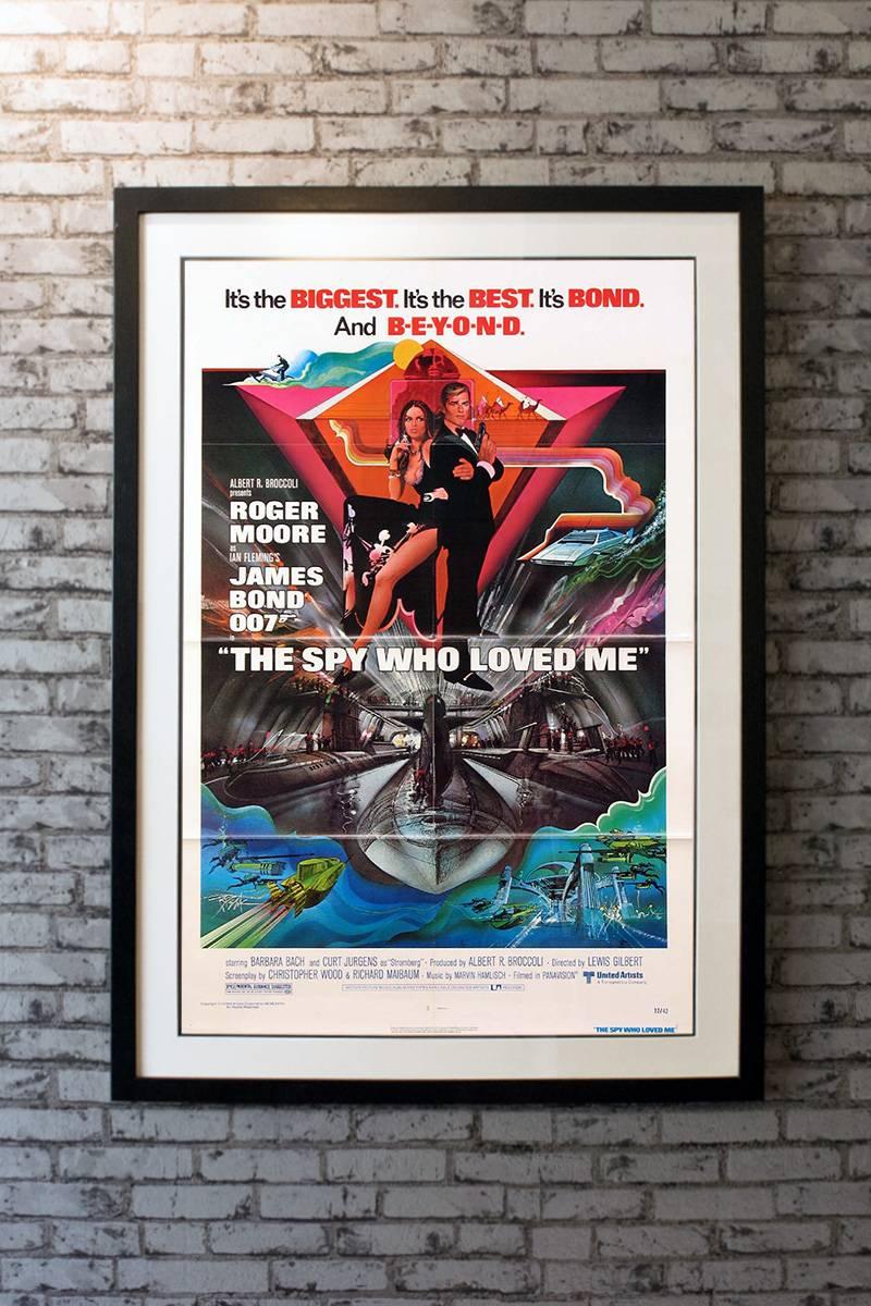 In a globe-trotting assignment that has him skiing off the edges of cliffs and driving a car deep underwater, British super-spy James Bond (Roger Moore) unites with sexy Russian agent Anya Amasova (Barbara Bach) to defeat megalomaniac shipping