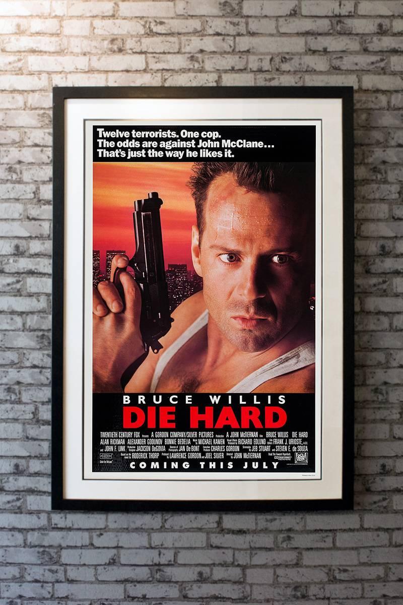New York City policeman John McClane (Bruce Willis) is visiting his estranged wife (Bonnie Bedelia) and two daughters on Christmas Eve. He joins her at a holiday party in the headquarters of the Japanese-owned business she works for. But the