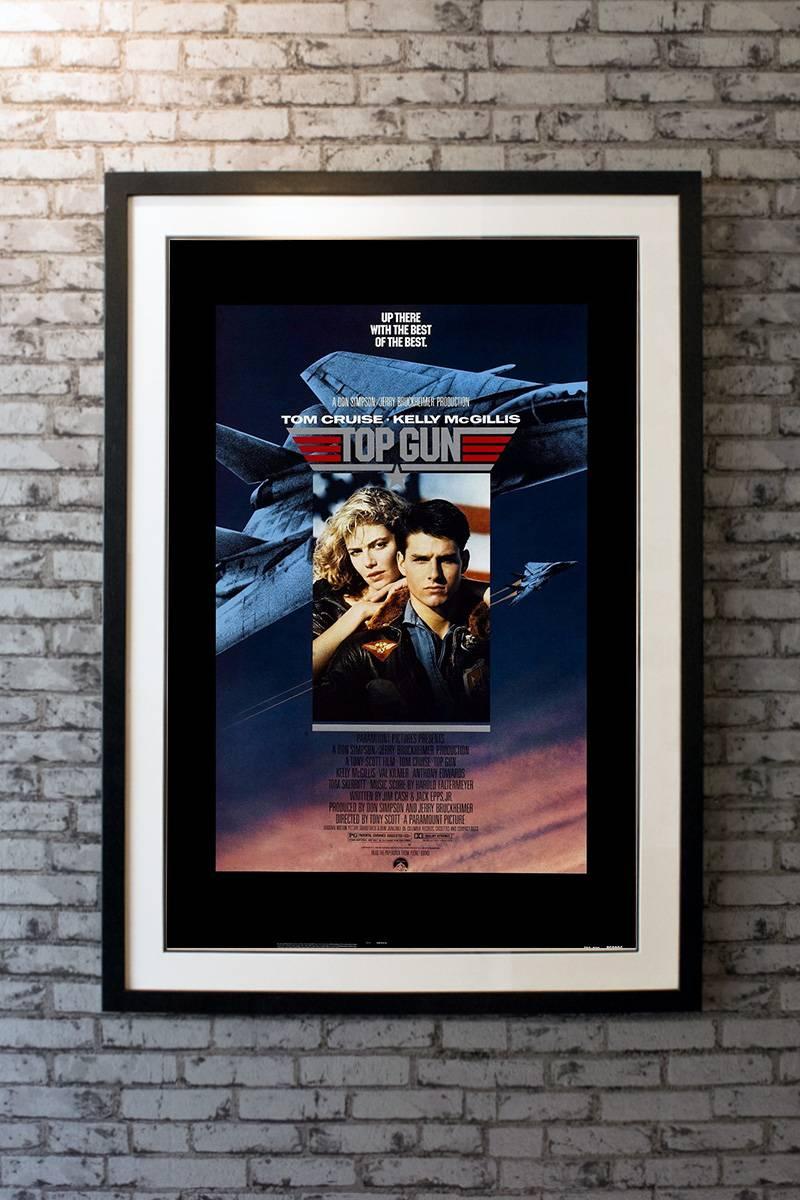 Fabulous and iconic, 1980s poster, destined to soar in value as 1980s pieces come into vogue. As students at the Navy's elite fighter weapons school compete to be best in the class, one daring young flyer learns a few things from a civilian