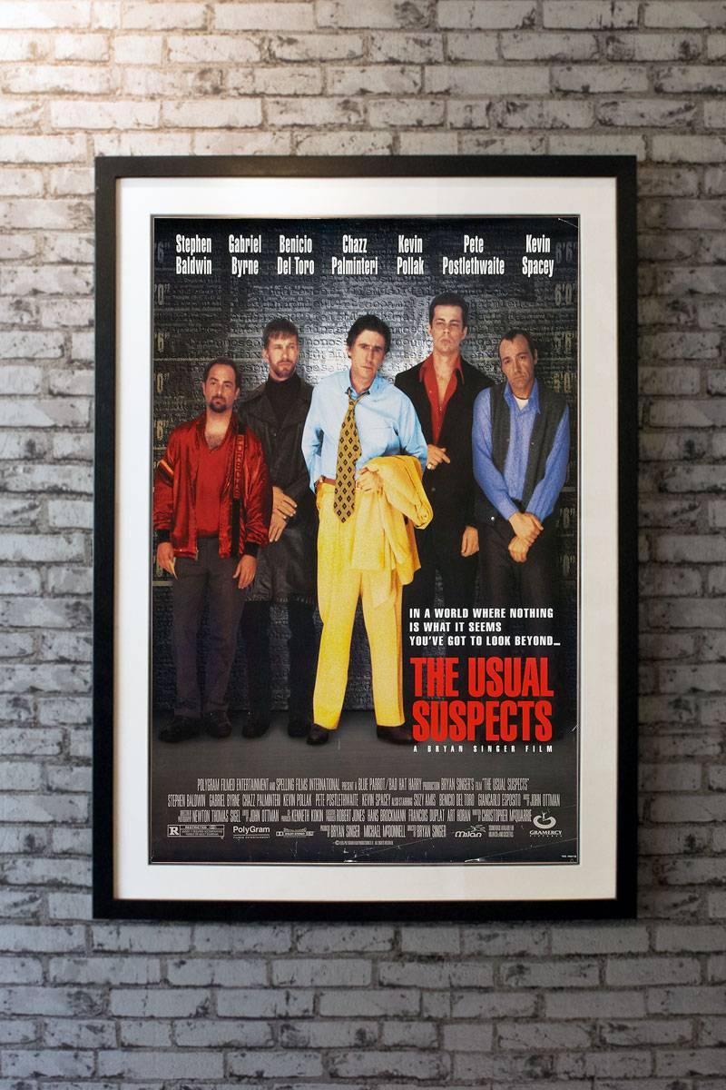 Starring Stephen Baldwin, Gabriel Byrne, Benicio Del Toro, Kevin Pollak, and Kevin Spacey. Directed by Bryan Singer. An unrestored poster with bright color and a clean overall appearance. It may have general signs of use, such as slight edge wear,